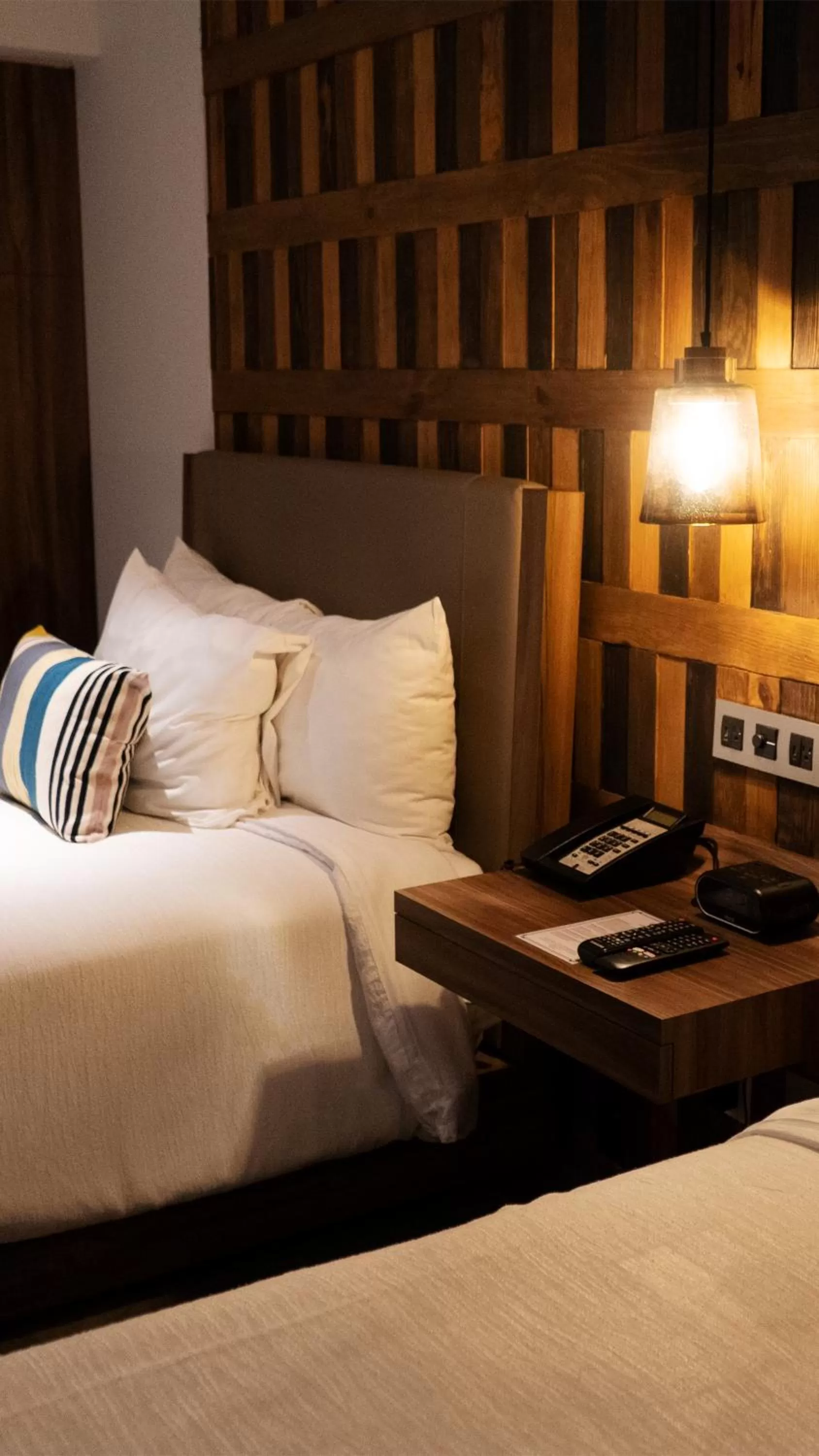 Bed in Hotel Indigo Guadalajara Expo by IHG