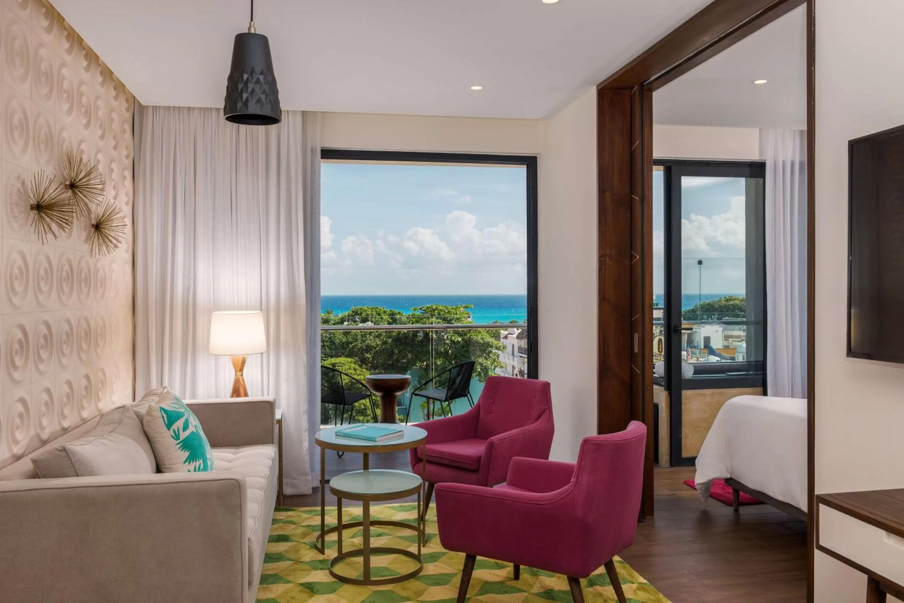 Living room in The Fives Downtown Hotel & Residences, Curio Collection by Hilton