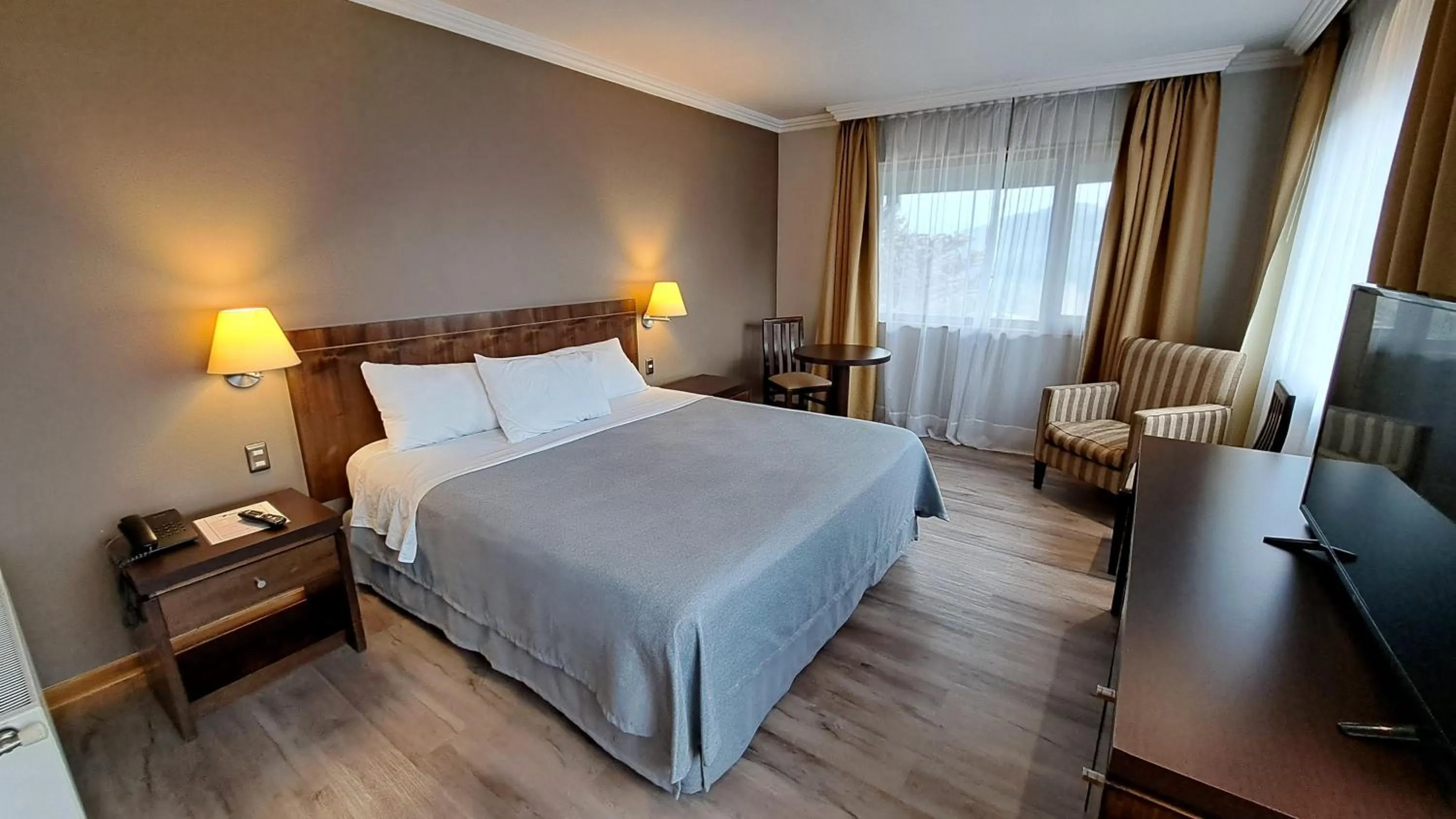 Photo of the whole room, Bed in Hotel Diego de Almagro Coyhaique