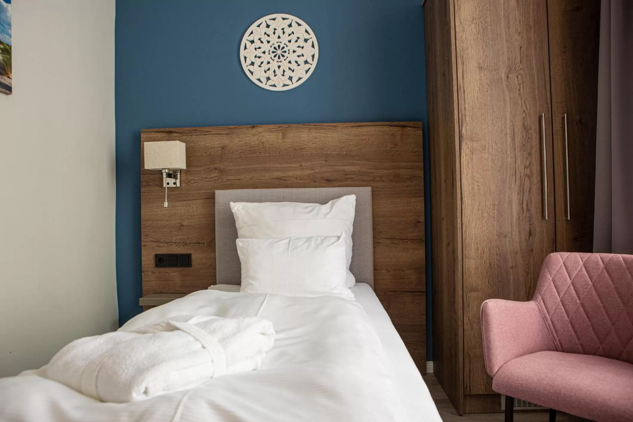 Bed in Romantik Hotel Aquarium