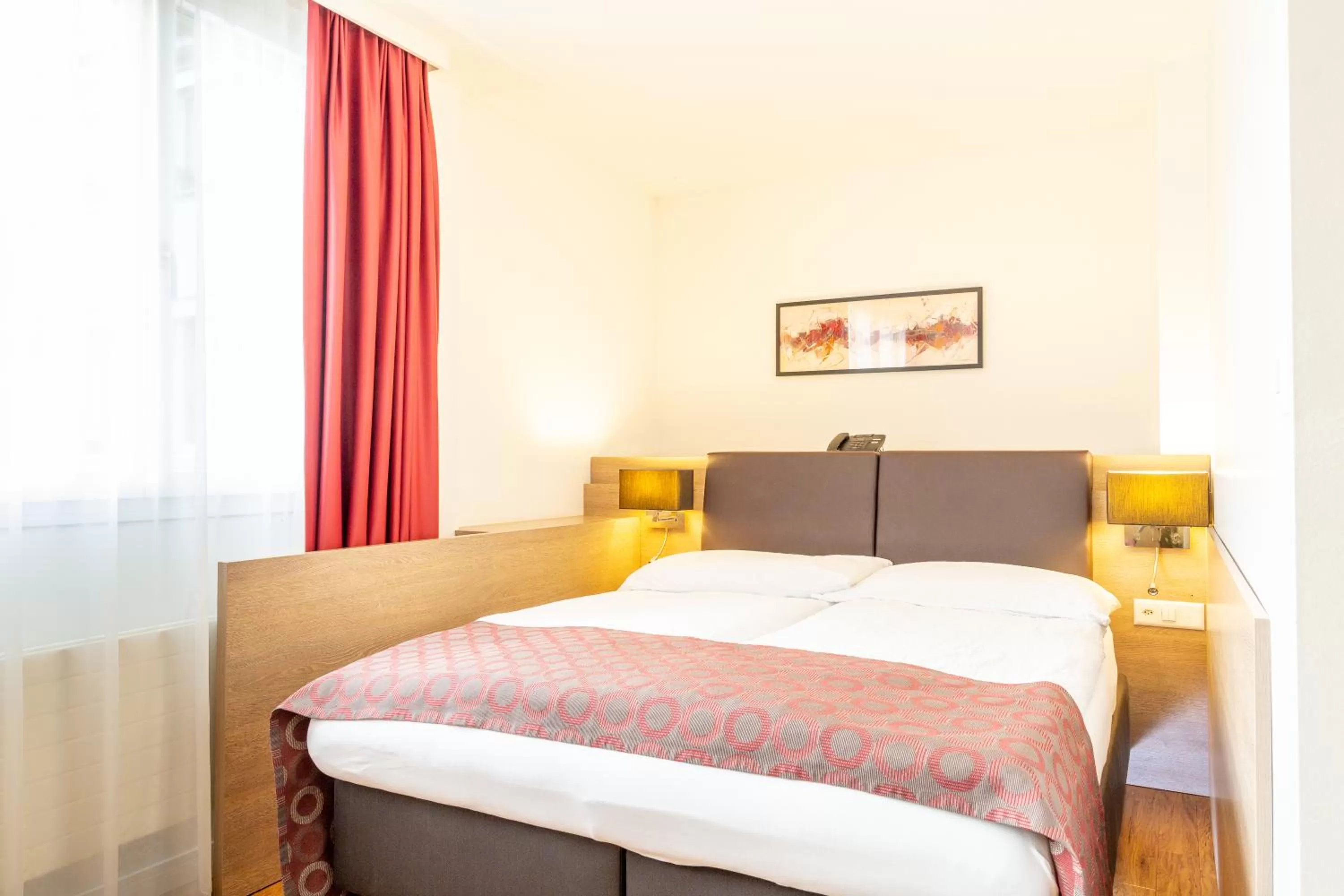 Bed in Hotel Alexander