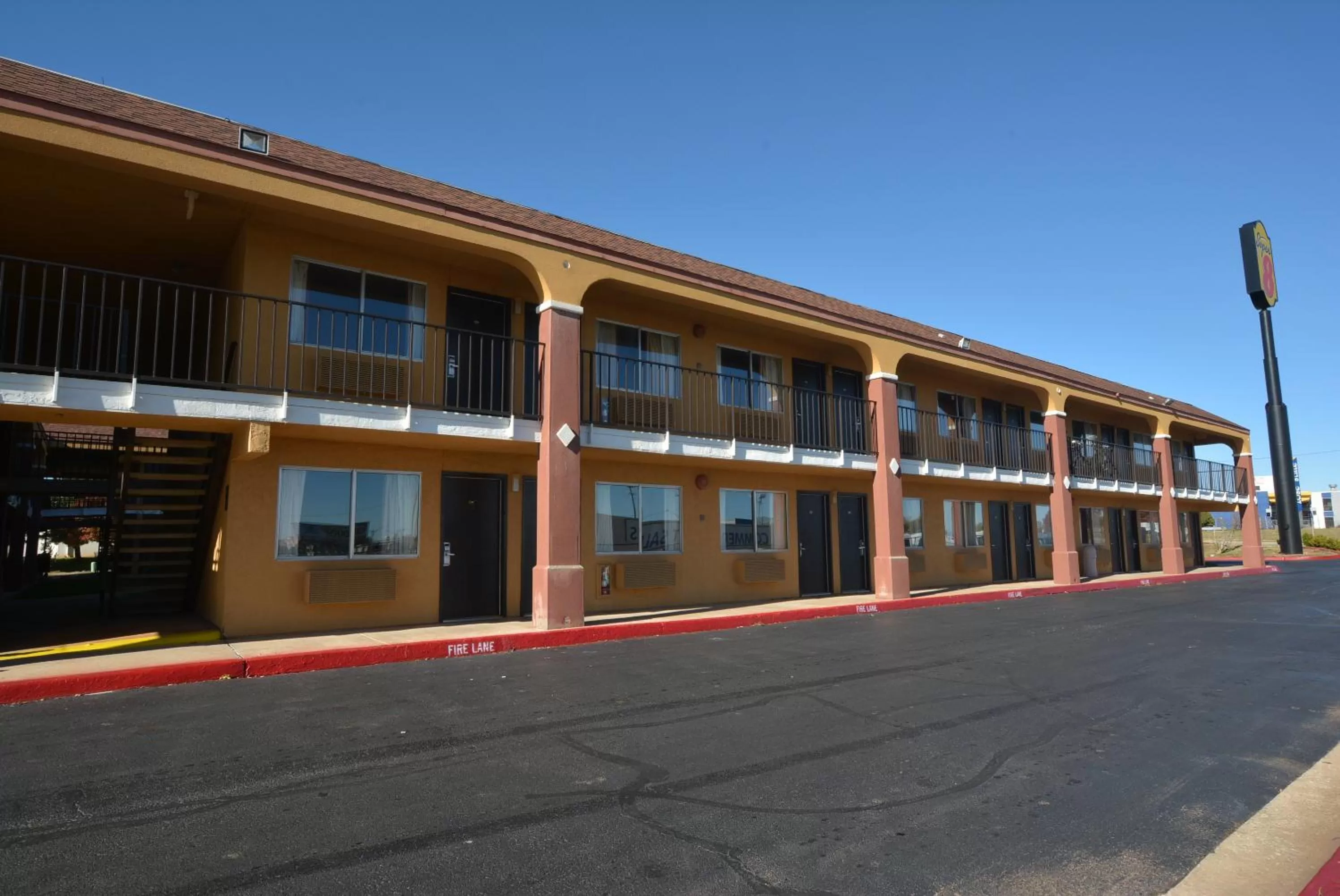 Property logo or sign in Super 8 by Wyndham Midwest City OK