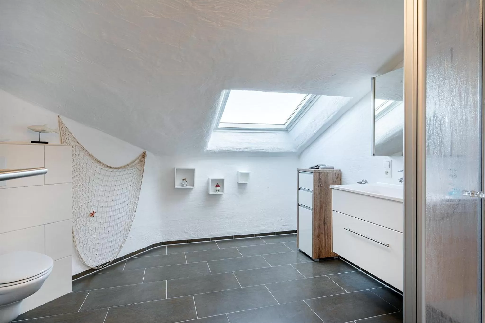 Toilet in Villa Moorstern am Badesee Tannenhausen