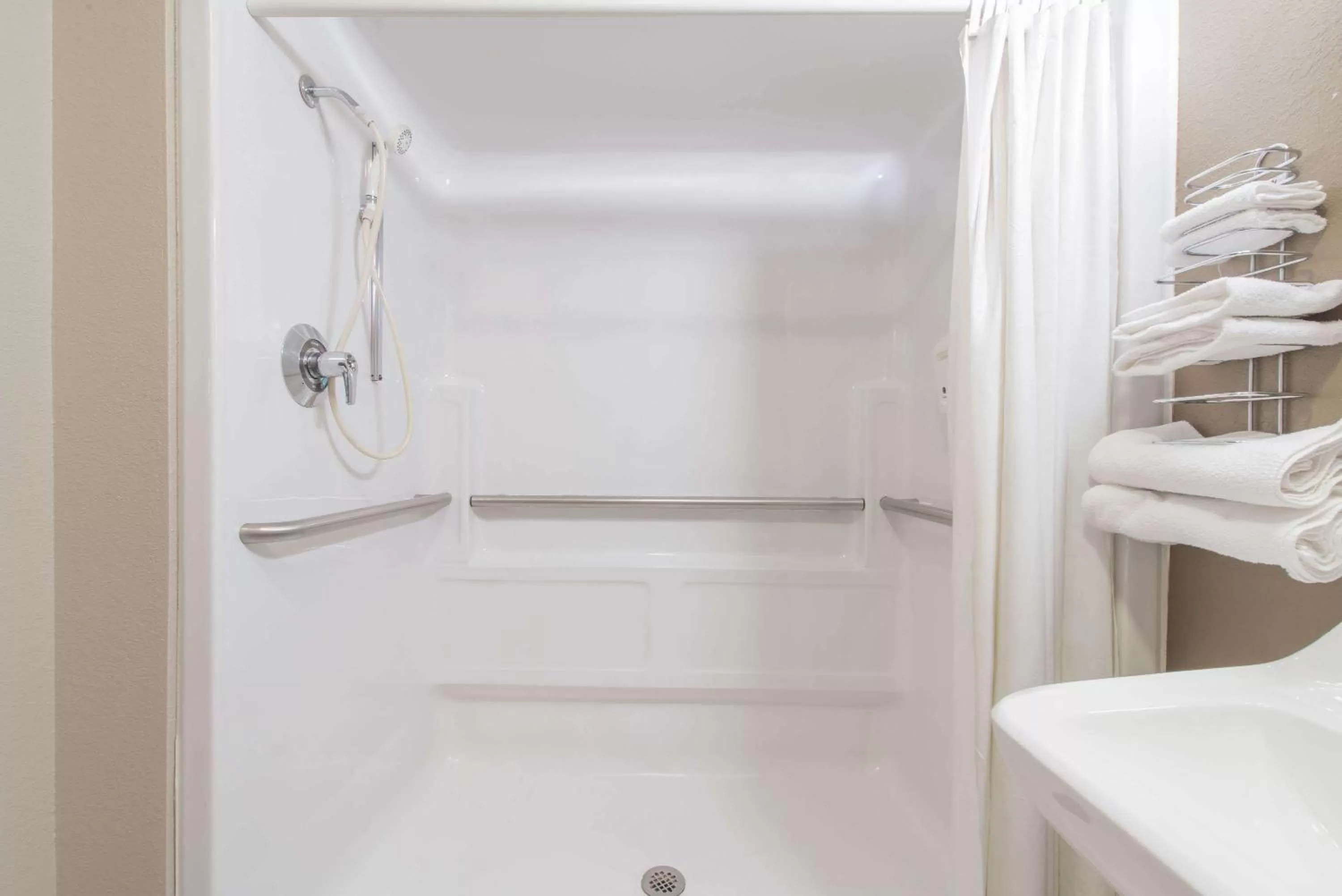 Bathroom in Super 8 by Wyndham Niagara Falls