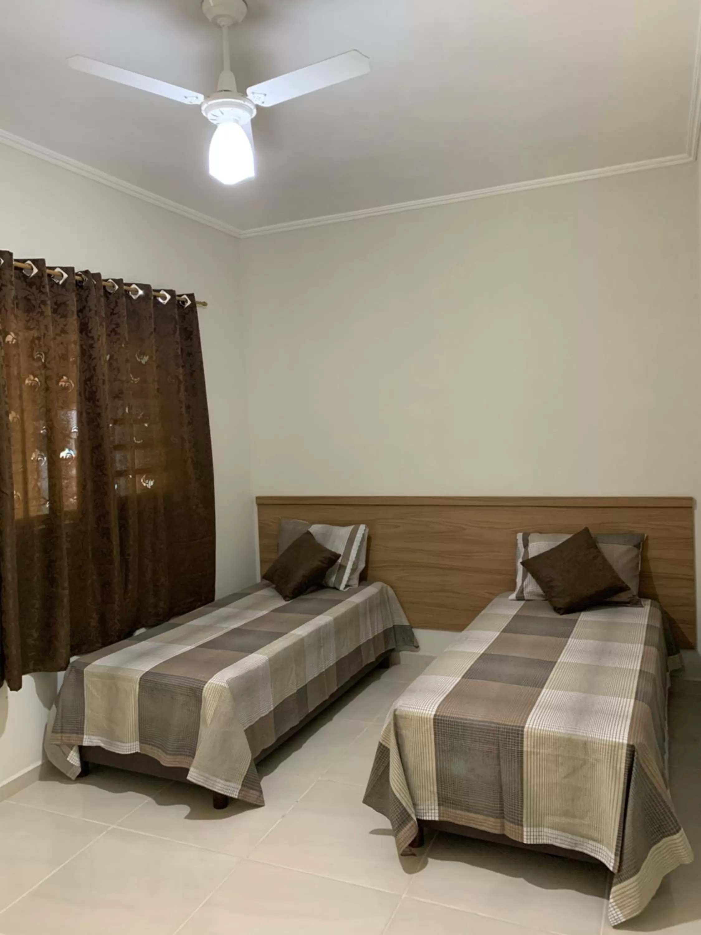 Bed in Pousada Ananda São Pedro