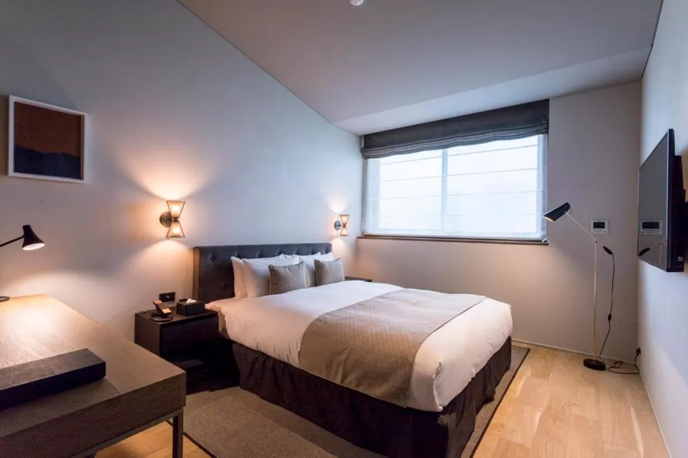 Bed in HOTEL CANATA KYOTO