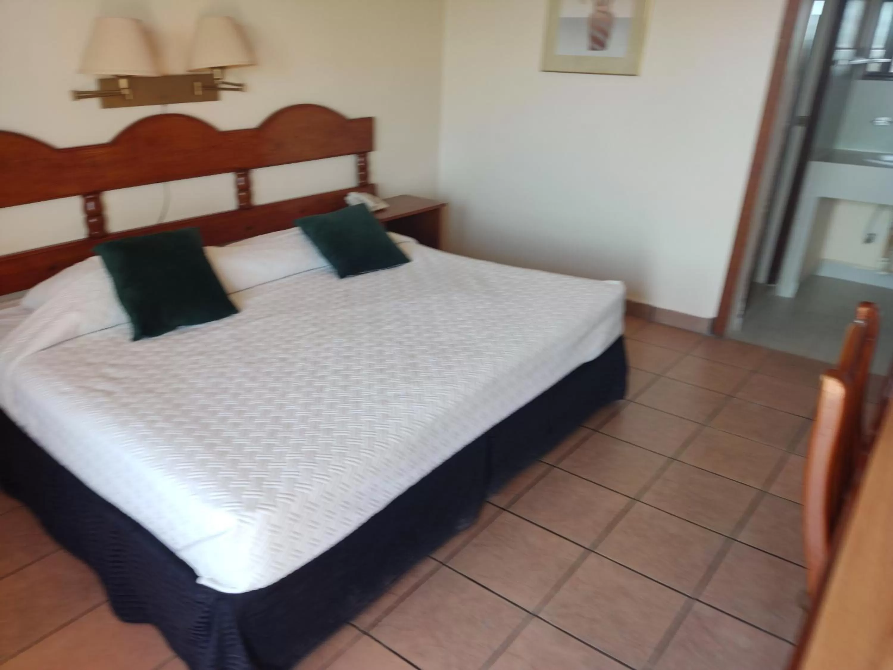 Bed in Hotel Posada Santa Fe Sabinas