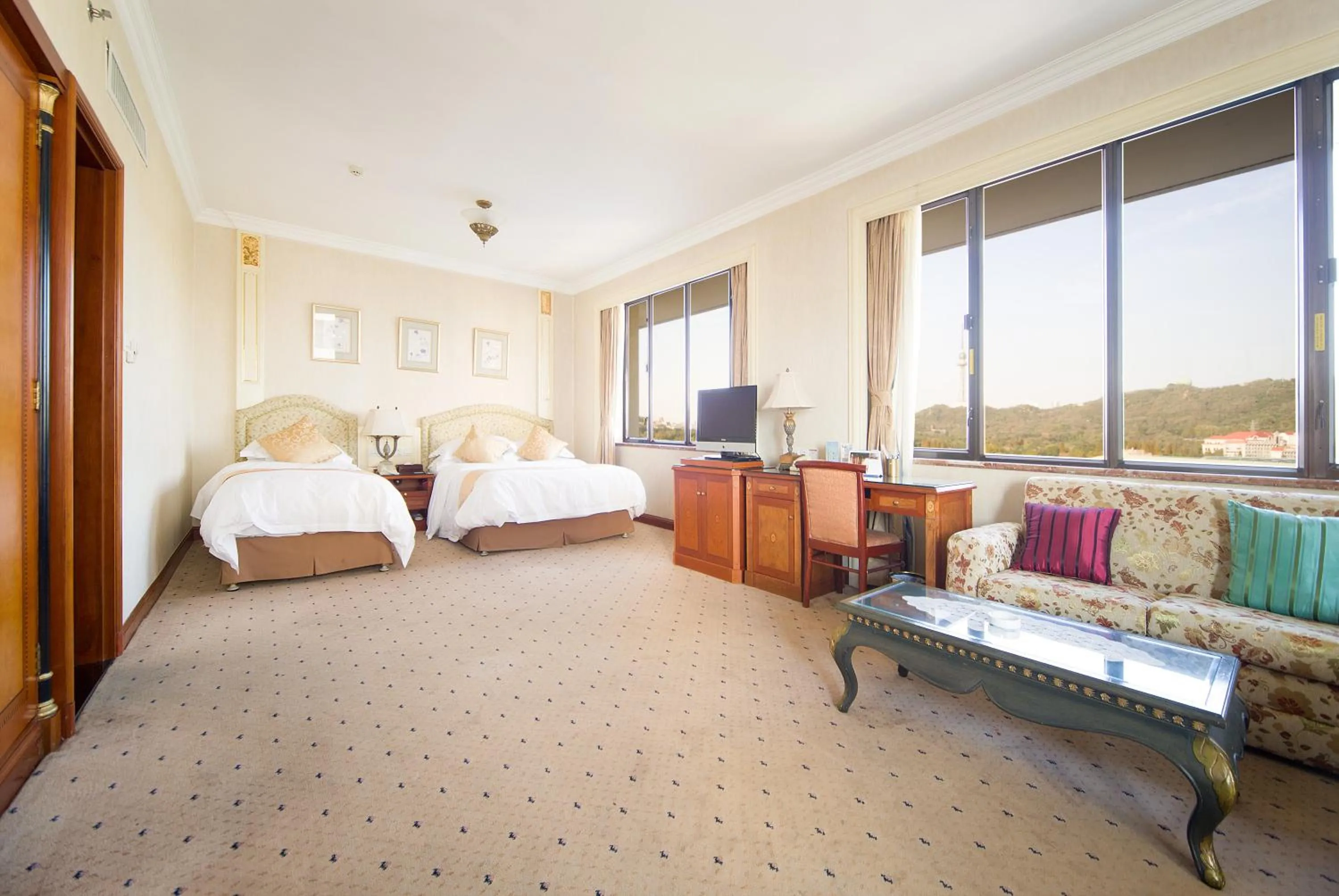 Bed in Huiquan Dynasty Hotel Qingdao