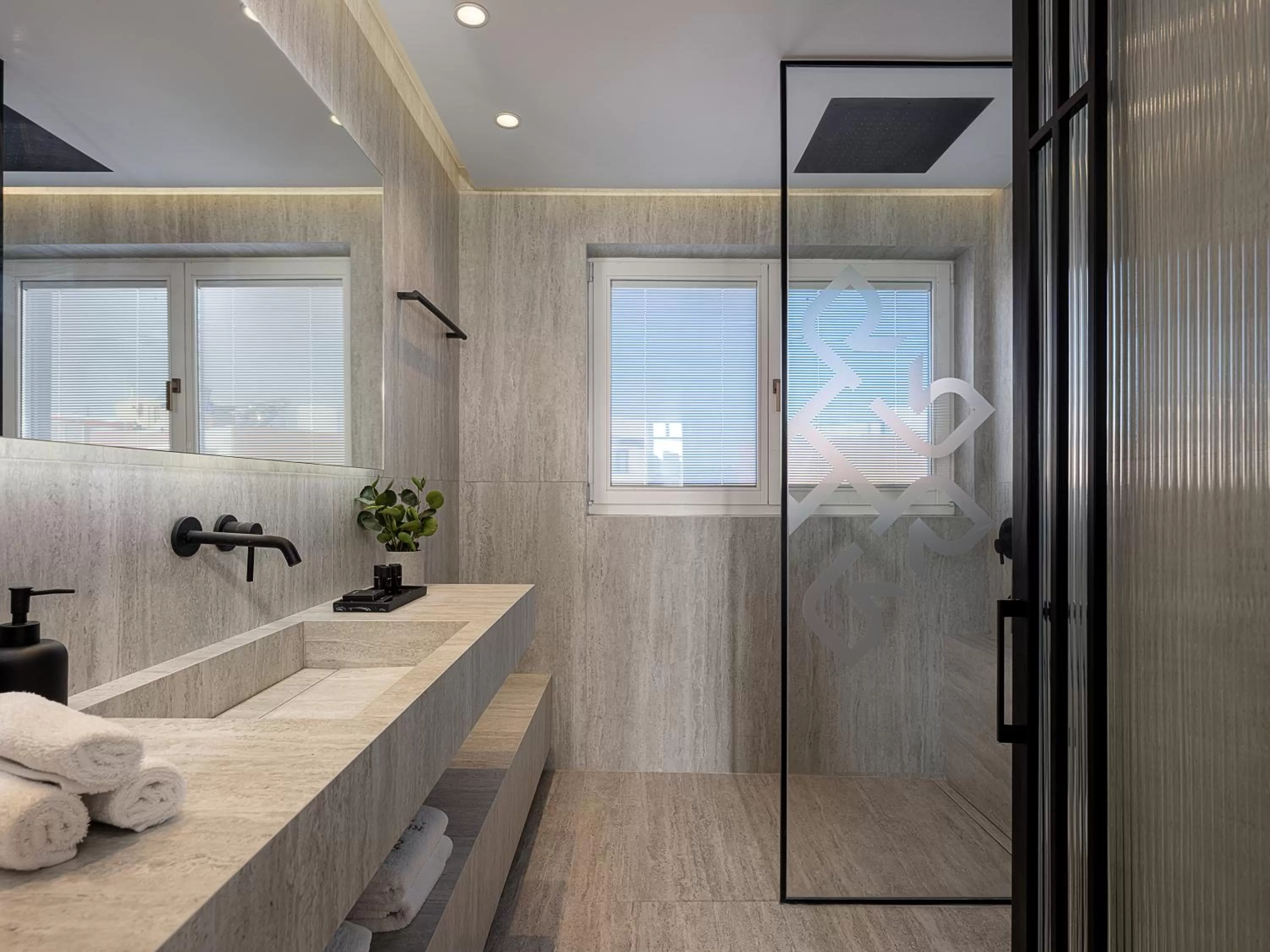 Bathroom in Riviera Suites