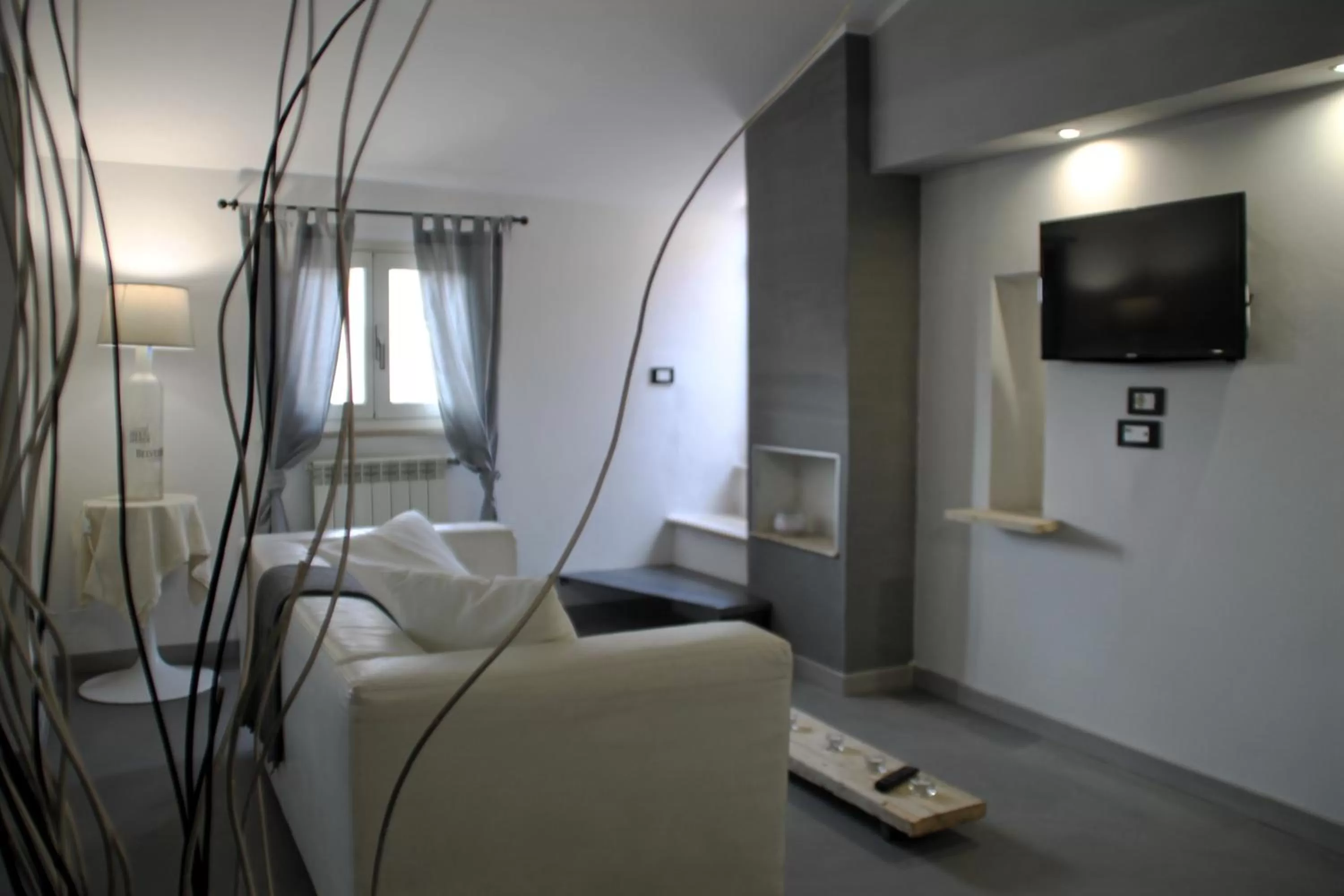 Living room, Bed in Antica Corte del Castello