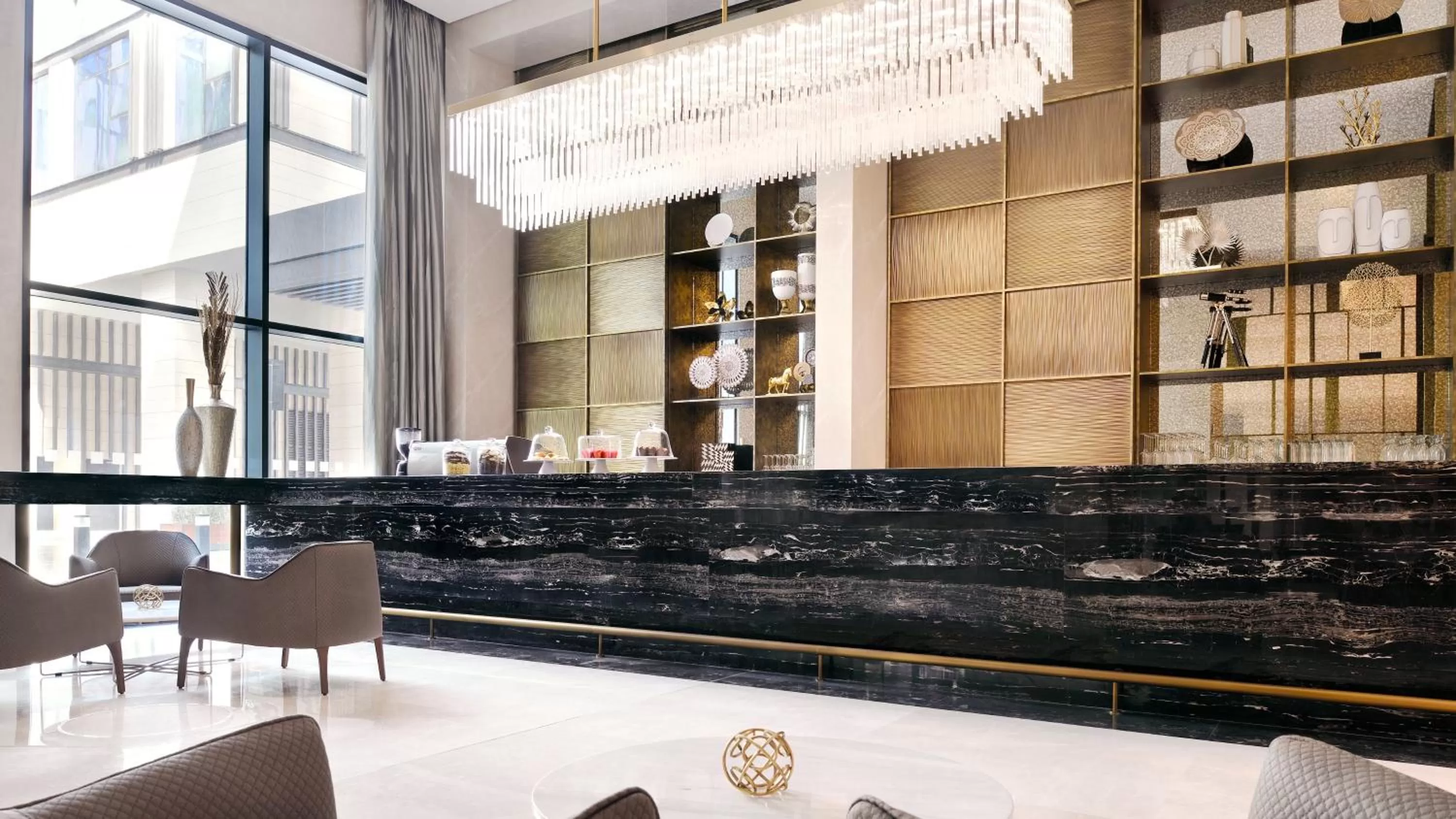 Lounge or bar in Holiday Inn Dubai Al-Maktoum Airport by IHG