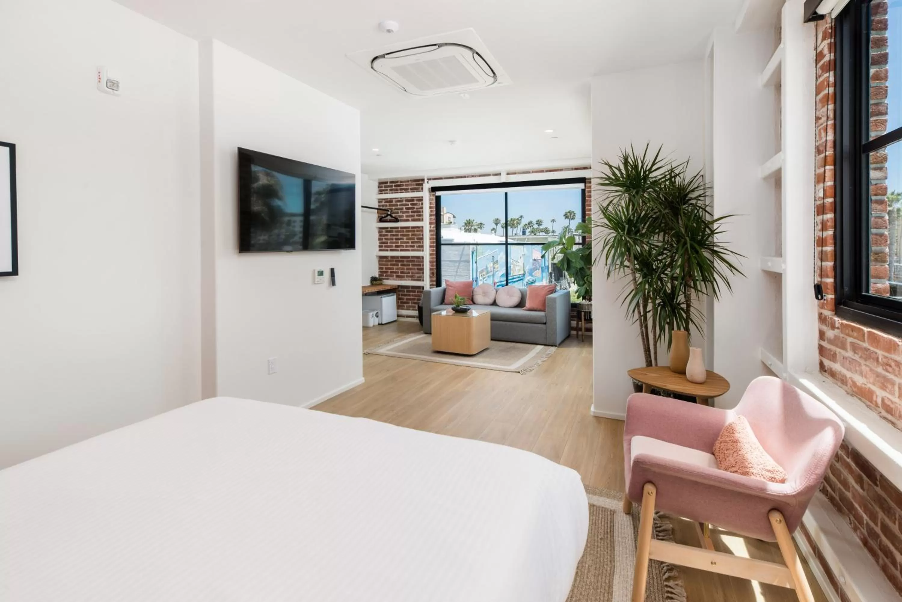 Seating area, Bed in The Brick Boutique Hotel