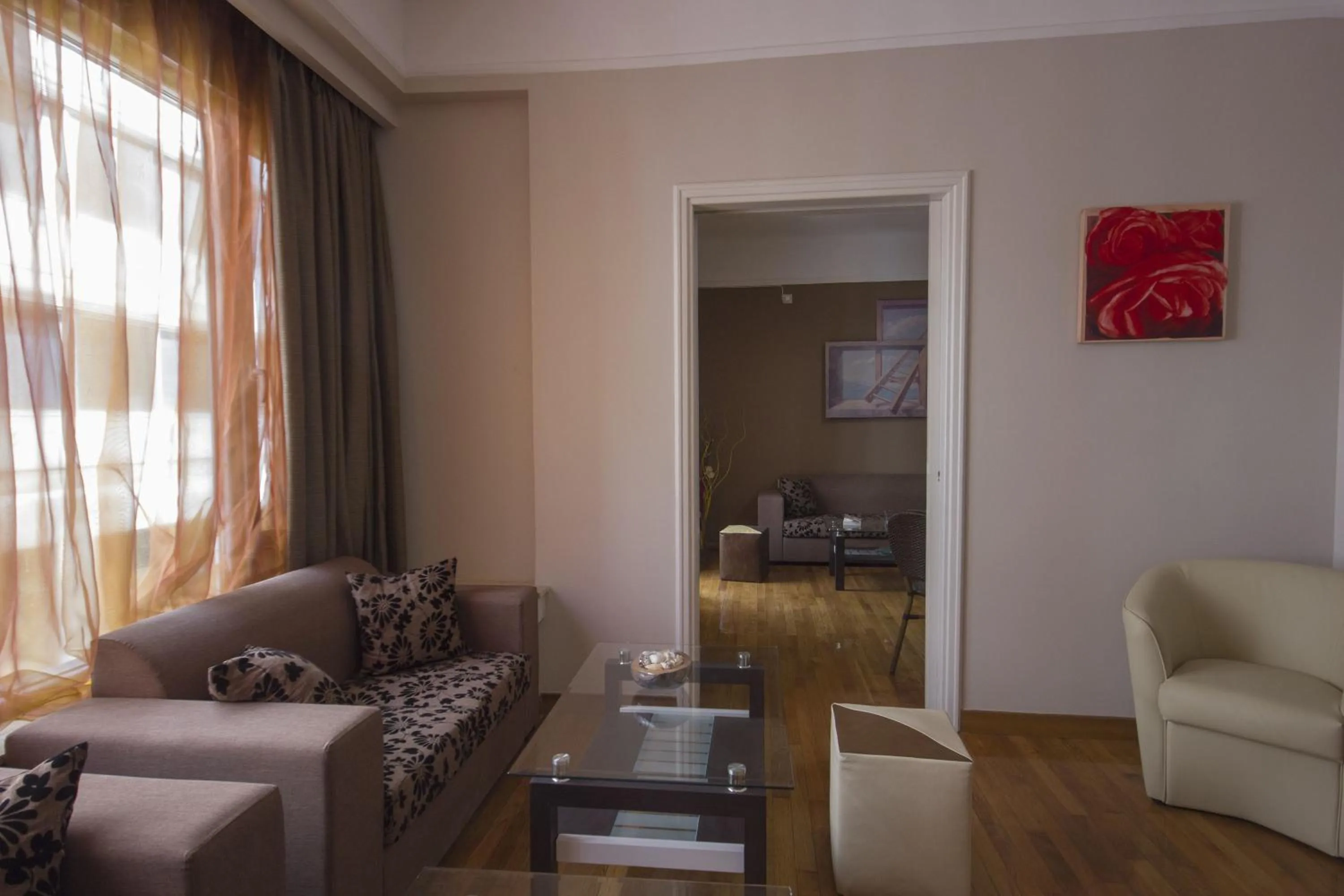 Communal lounge/ TV room in Ambrosia Suites