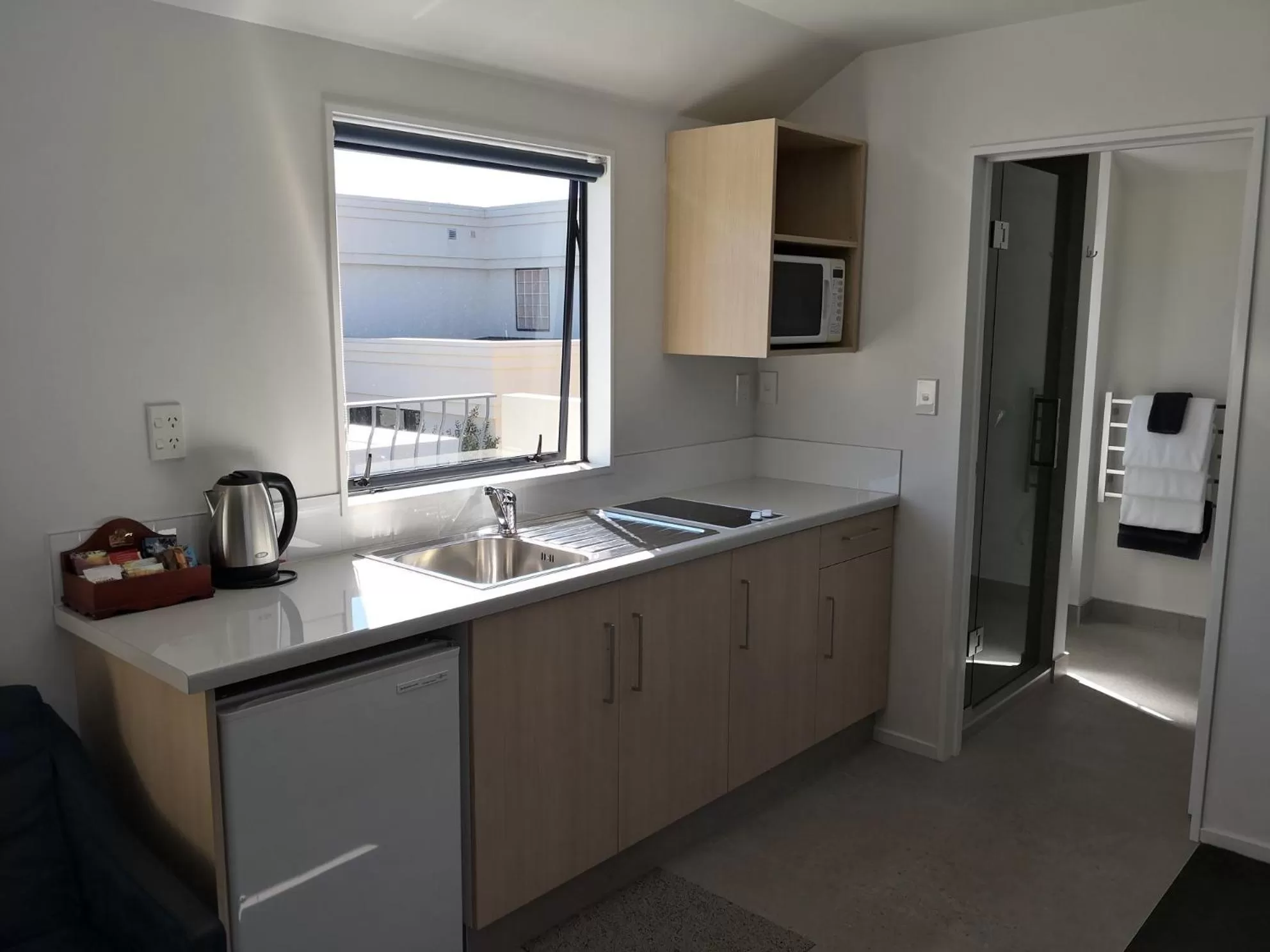 Kitchen or kitchenette in Annabelle Court Motel