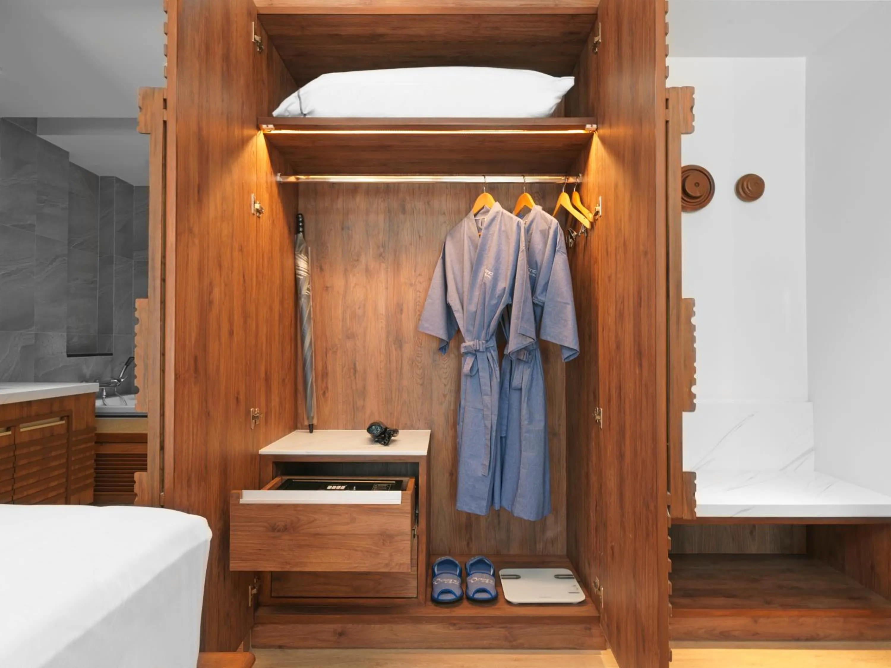 wardrobe in The Oceanic Sportel Phuket - SHA Extra Plus