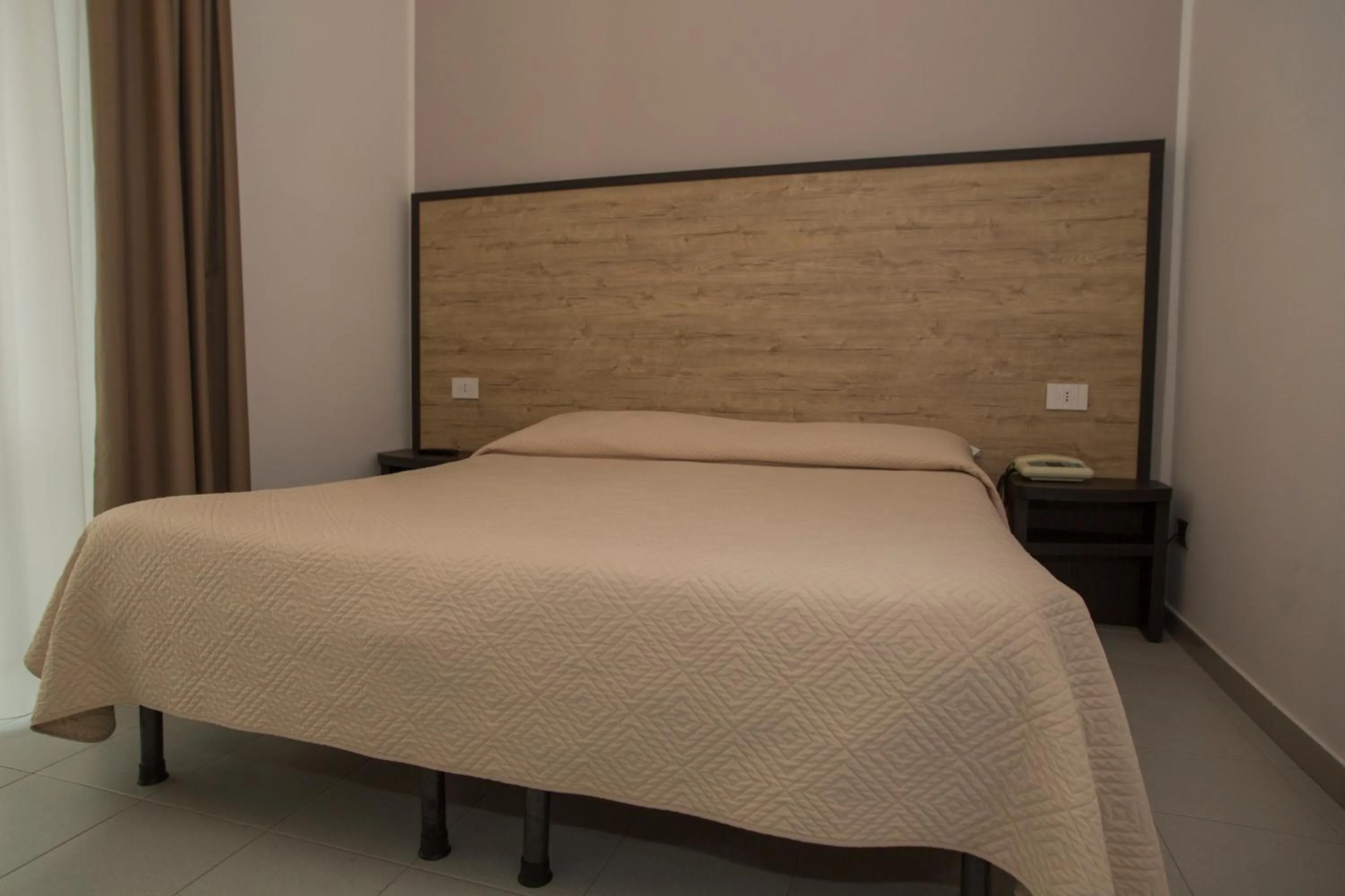 Bed in Hotel San Marco