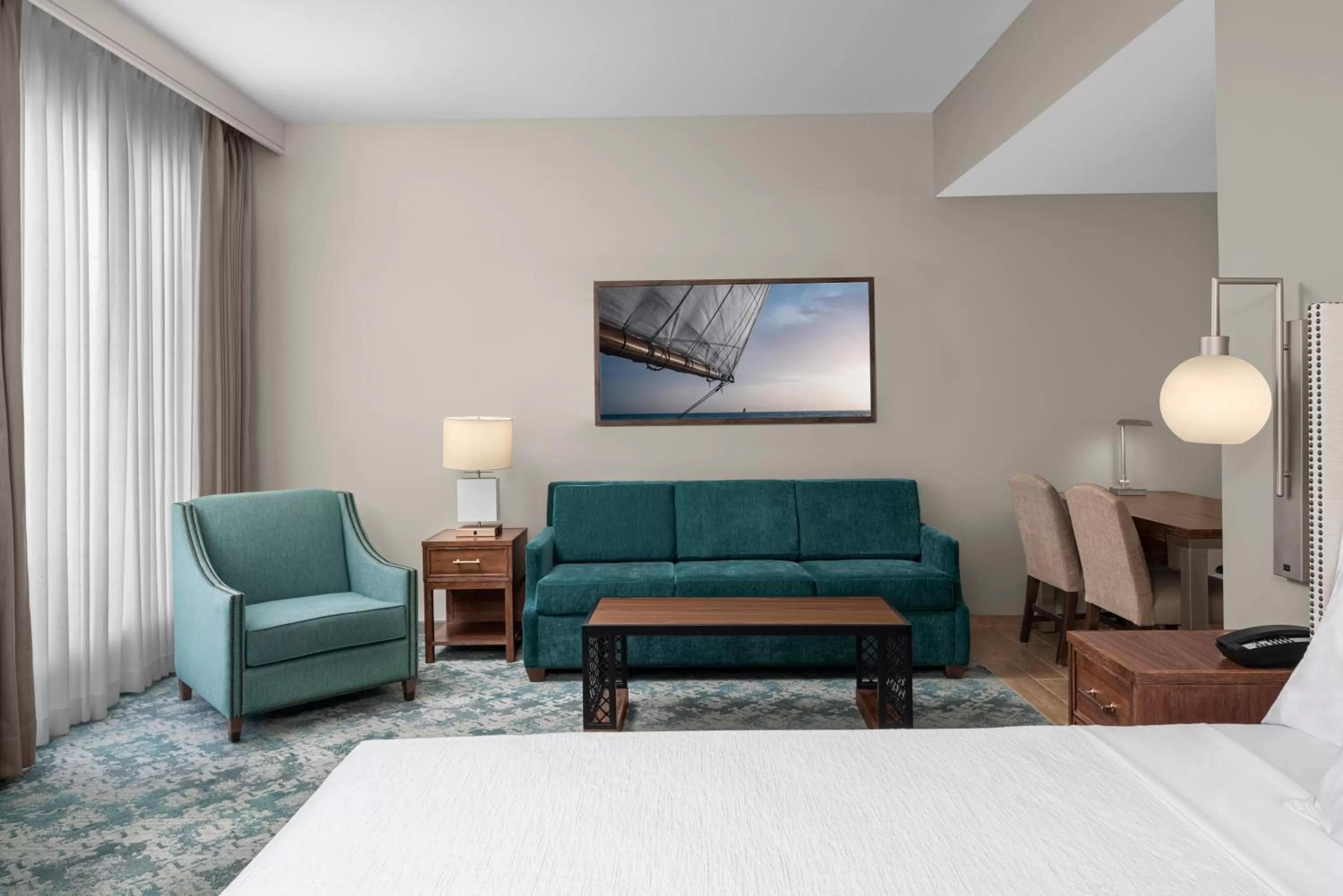 Seating area, Bed in Embassy Suites by Hilton Charleston Harbor Mt. Pleasant