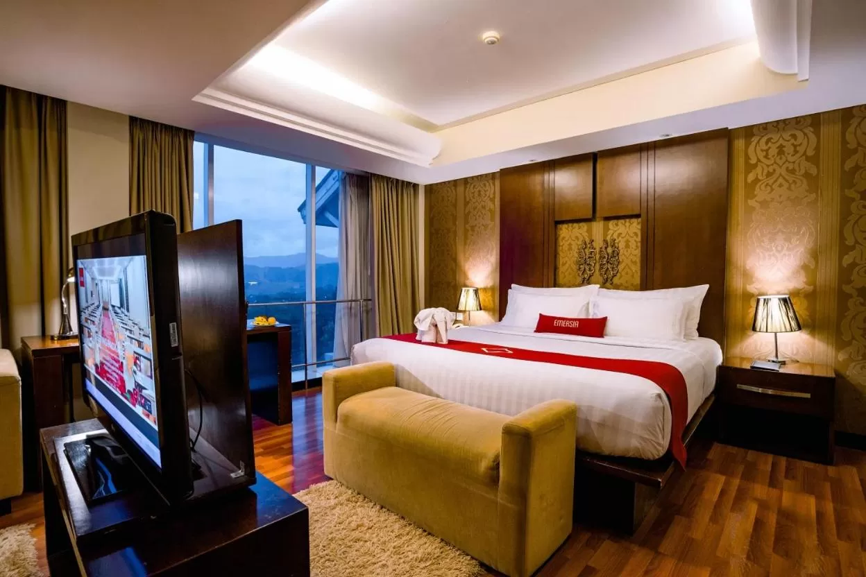 Bed in Emersia Hotel and Resort