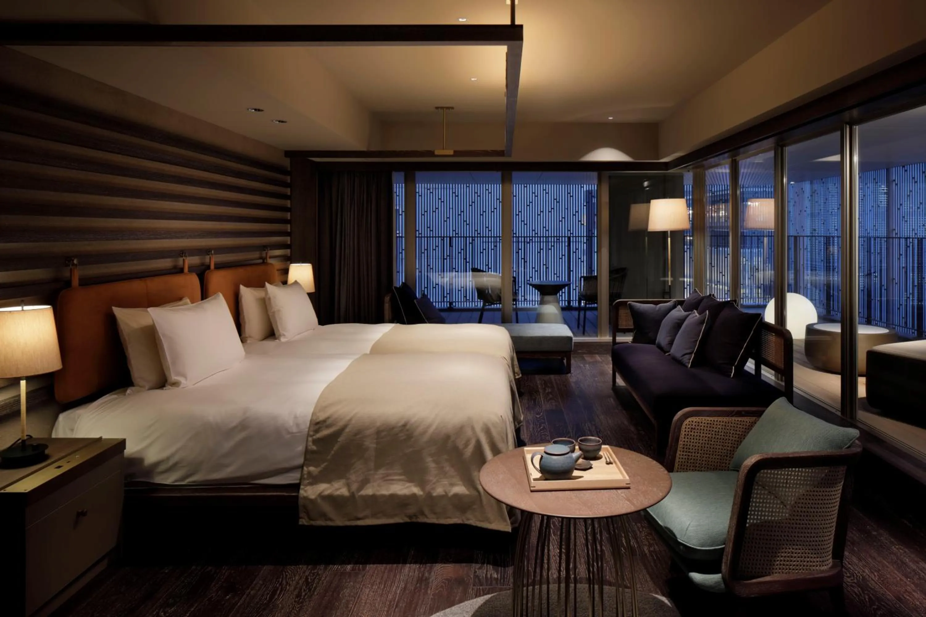 Bed in GOOD NATURE HOTEL KYOTO