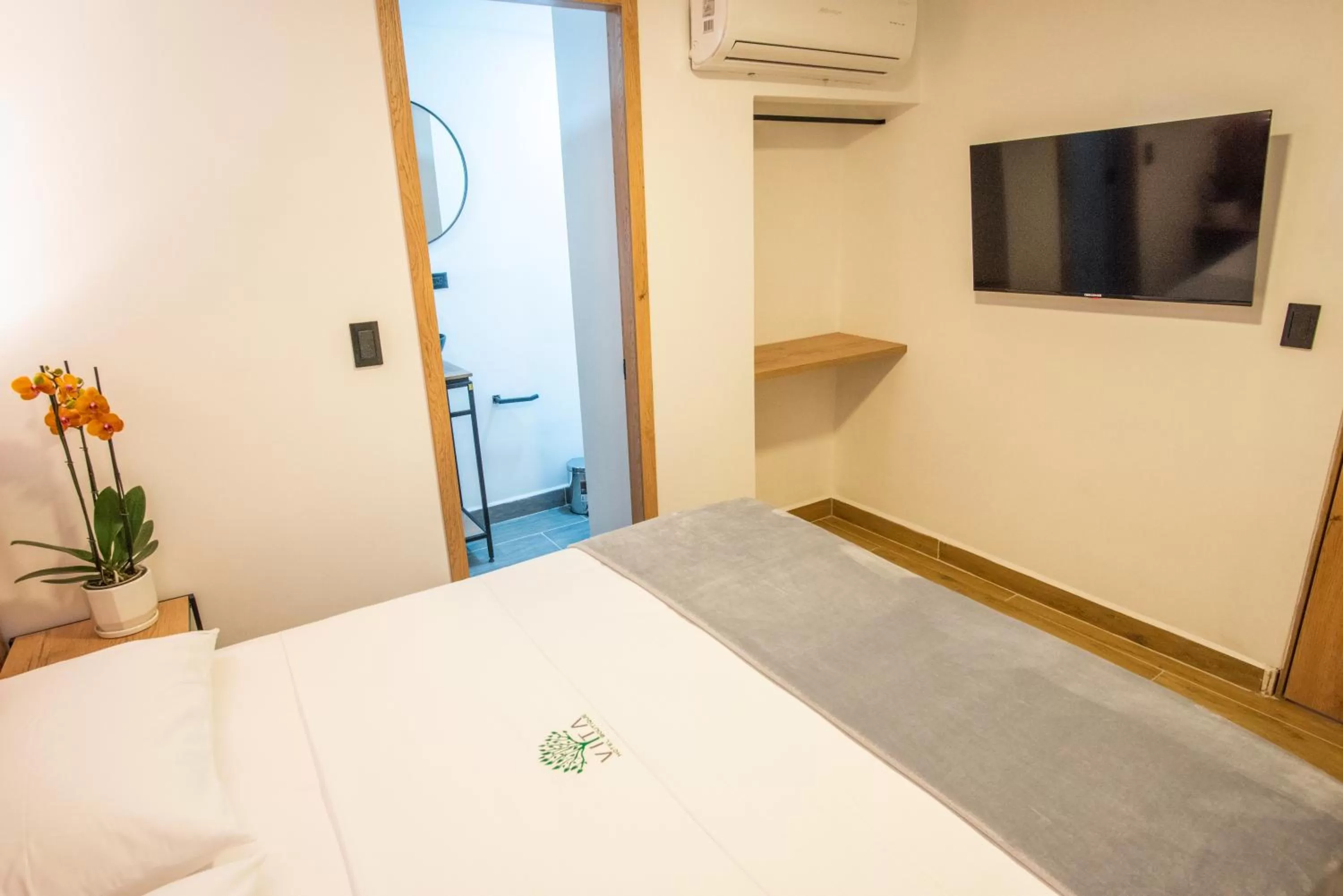 TV and multimedia, Bed in Vita Hotel Boutique - Aire Acondicionado & Desayuno