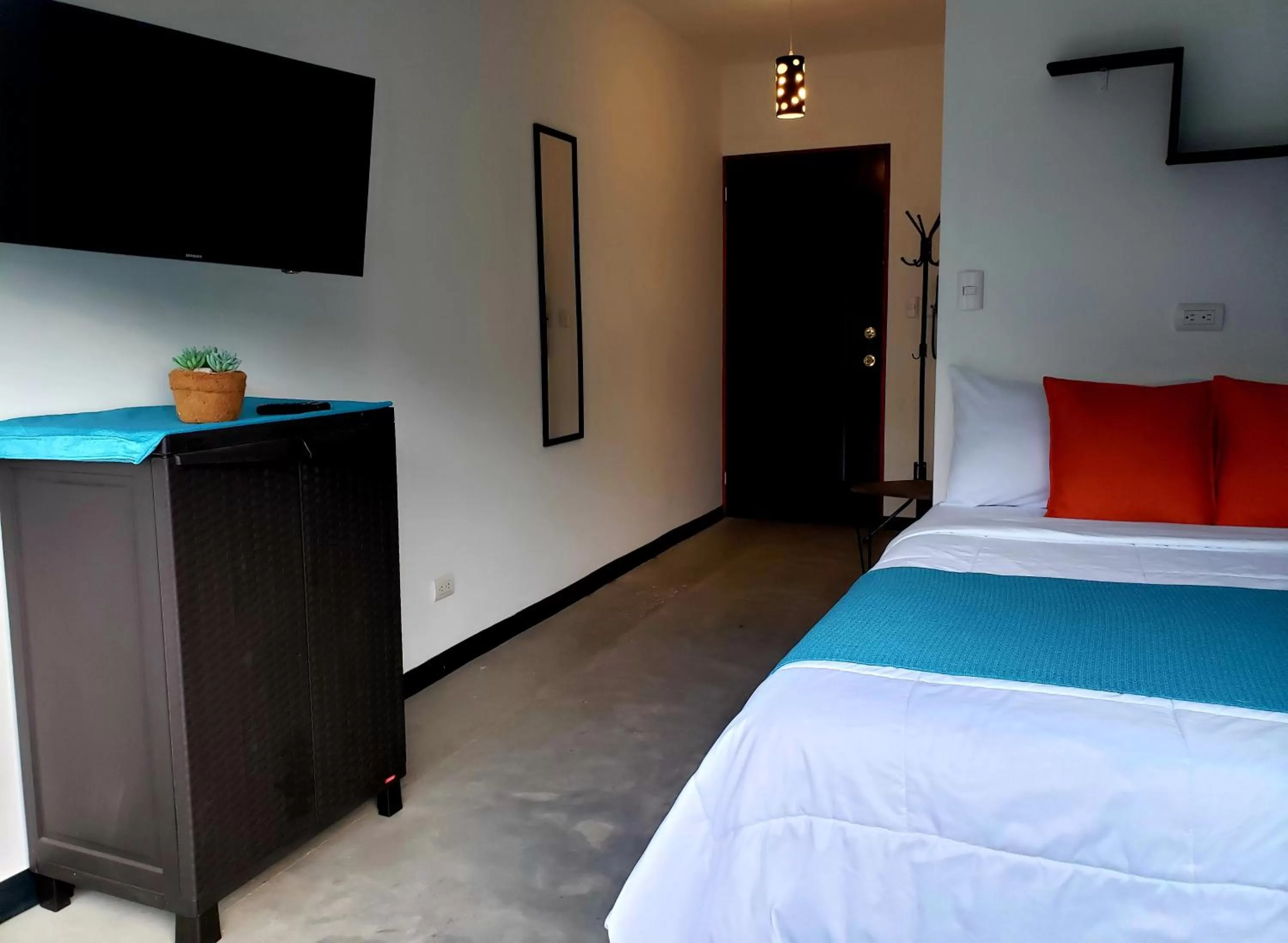 Photo of the whole room, TV/Entertainment Center in Cando Living Apartments in Central Avenue