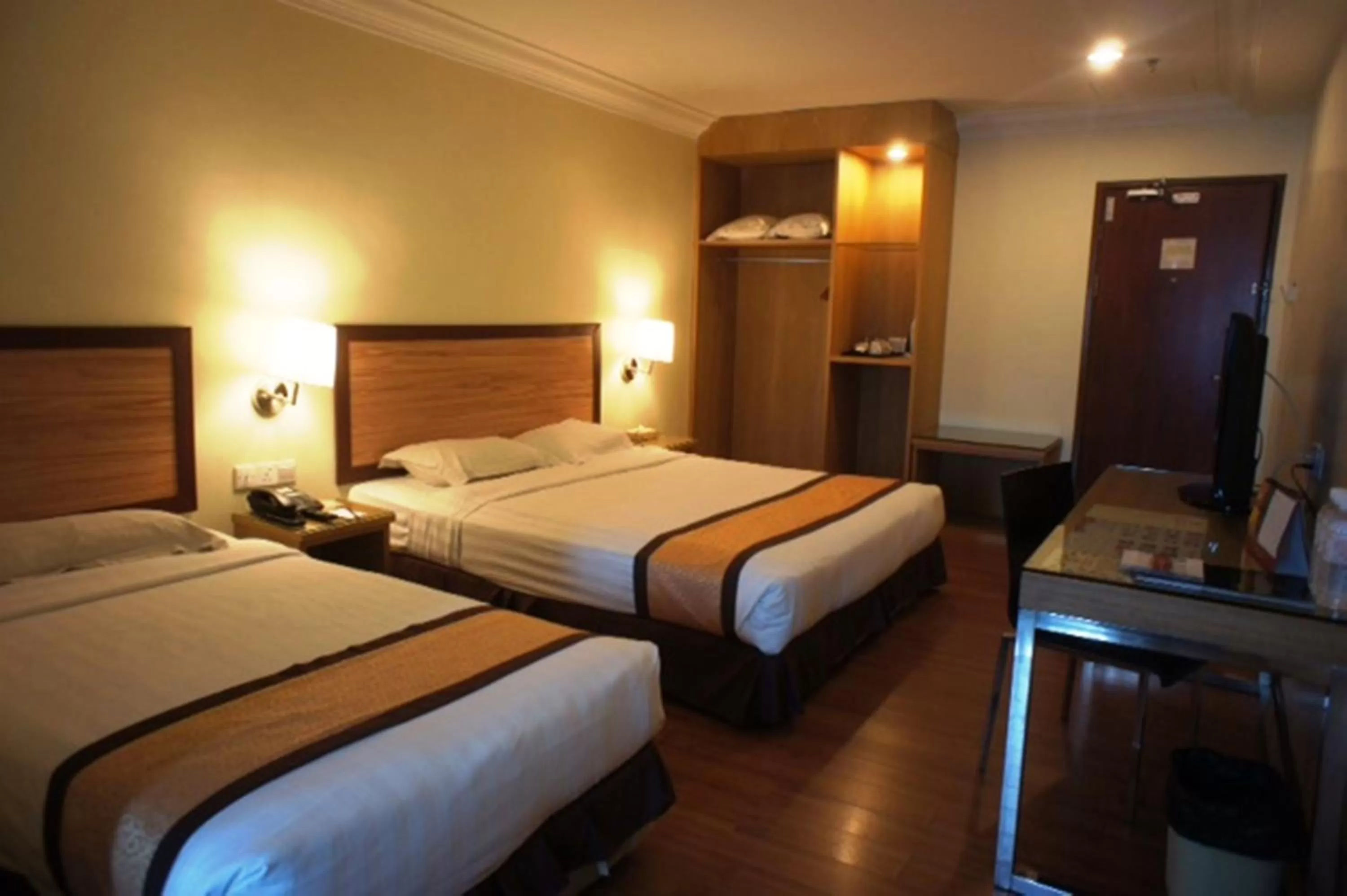 Bed in Tyng Garden Hotel