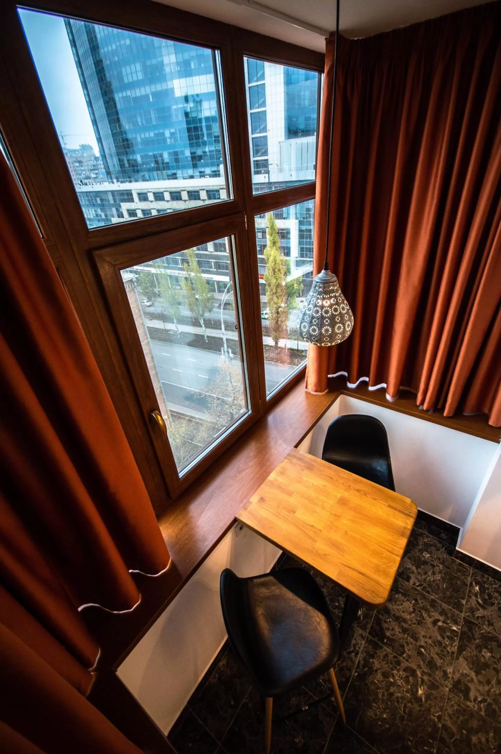 Balcony/Terrace, Bed in Kyiv Panorama Apartments near Gulliver