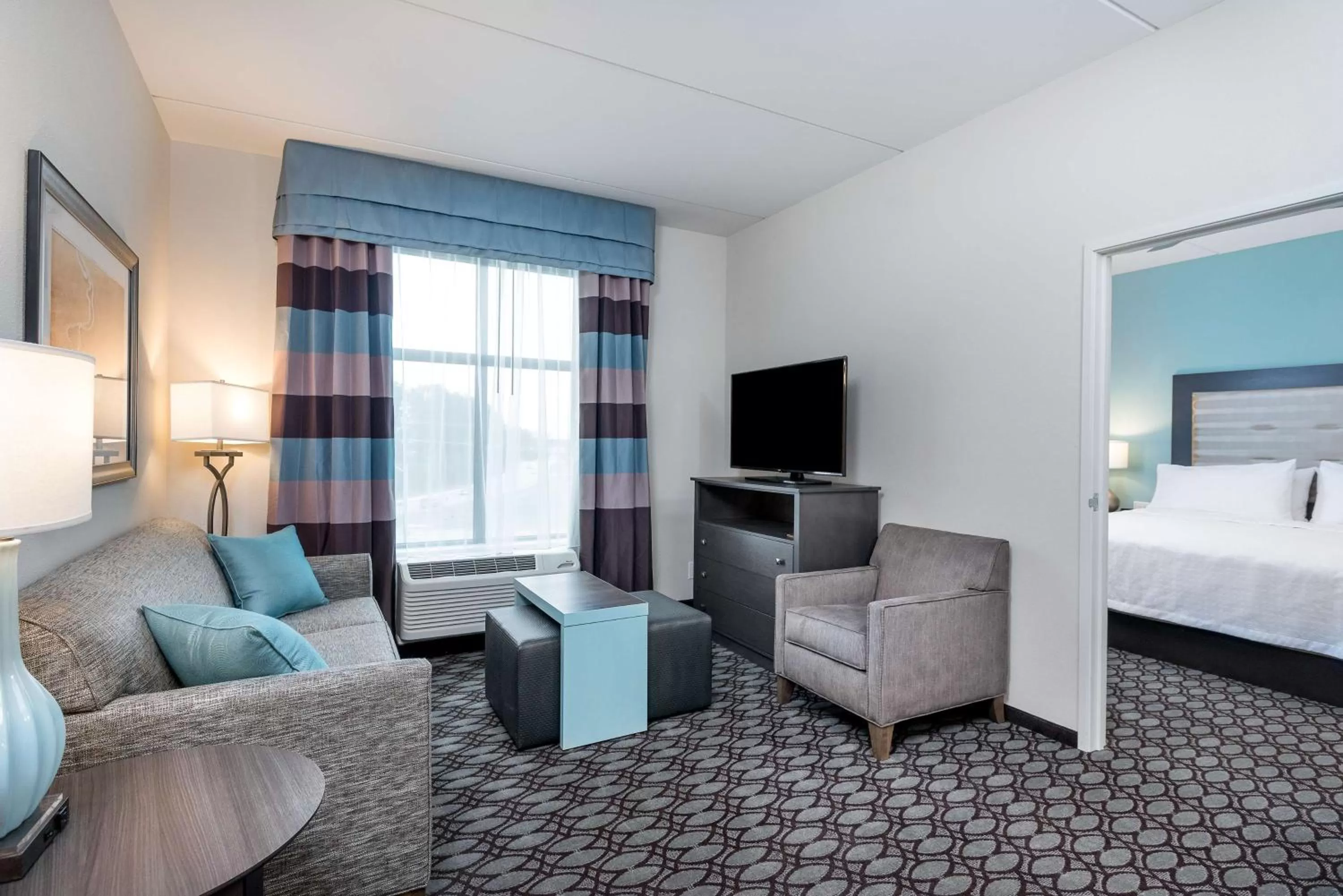 Living room, Bed in Homewood Suites By Hilton Fayetteville