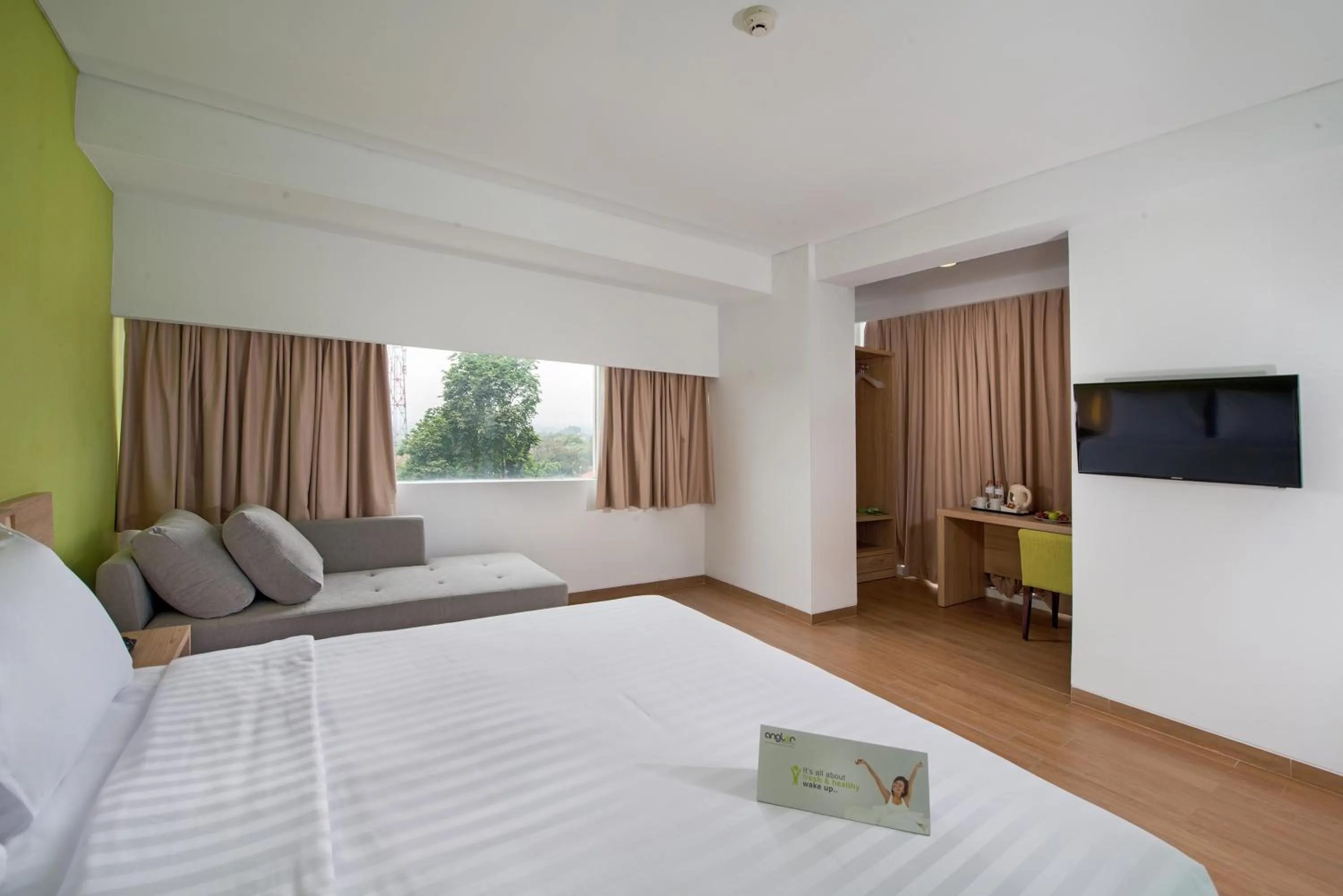 Property building, Bed in Whiz Prime Hotel Pajajaran Bogor