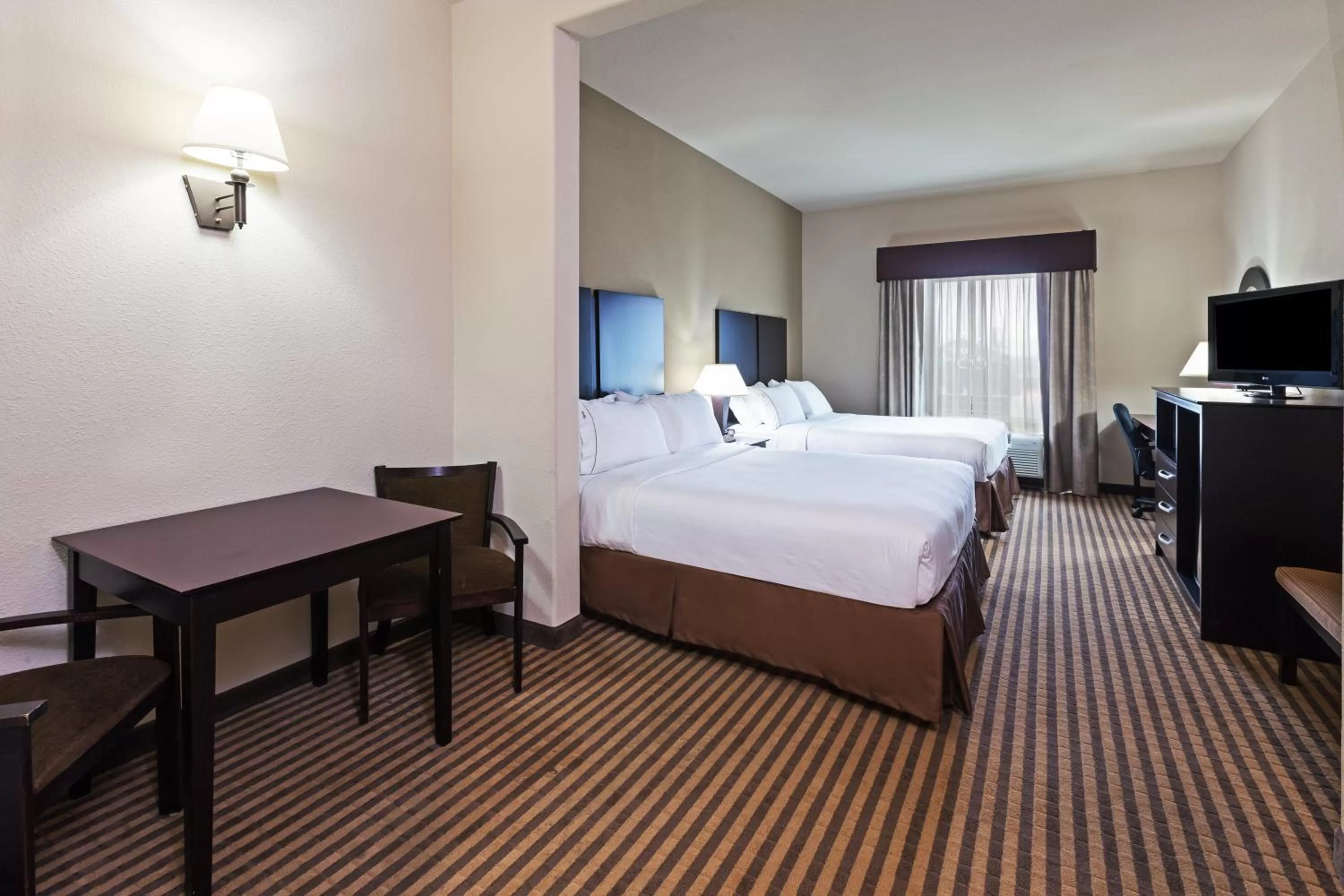 Queen Room with Two Queen Beds - Disability Access in Holiday Inn Express & Suites Brady, an IHG Hotel