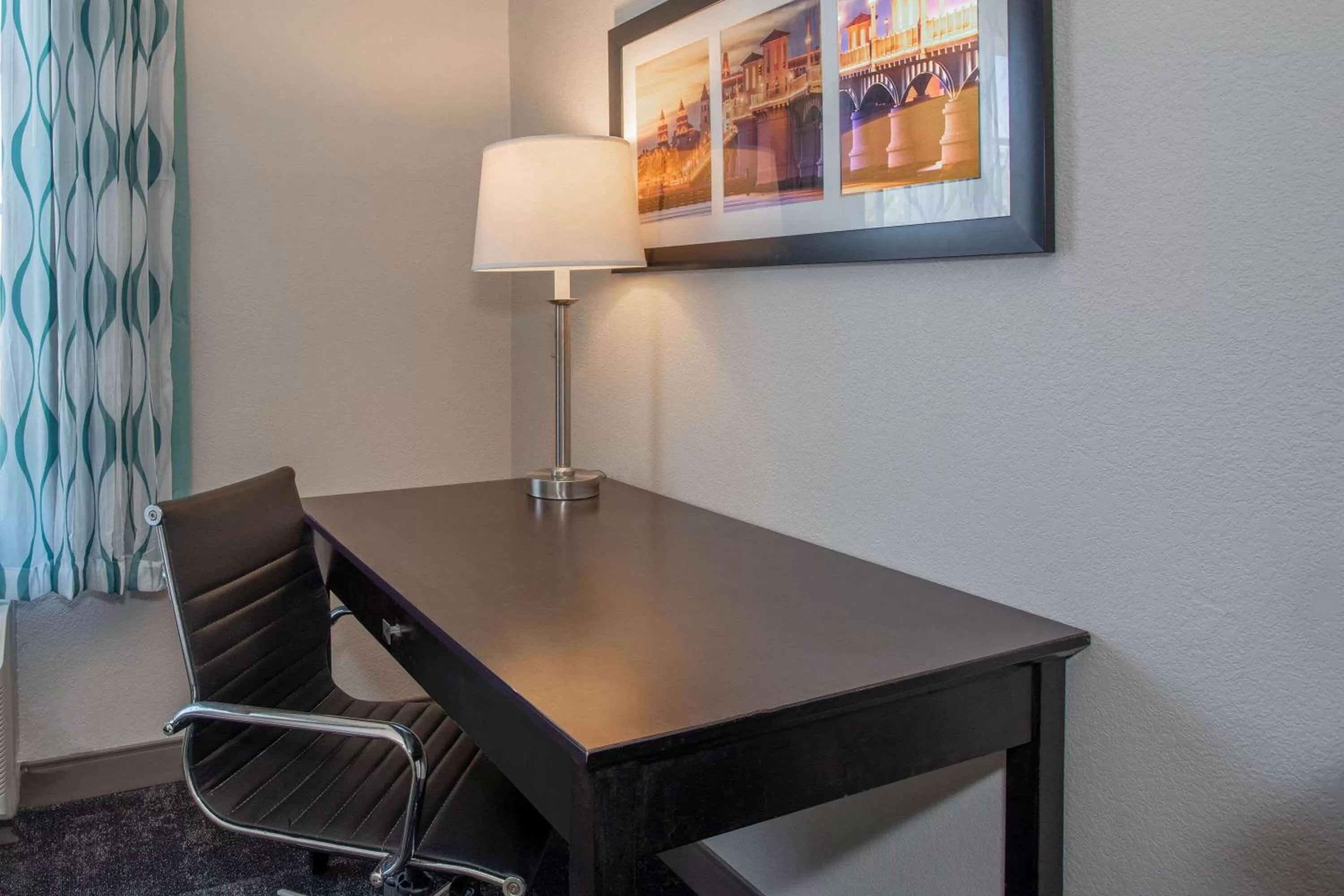 Photo of the whole room, TV/Entertainment Center in La Quinta Inn & Suites by Wyndham St. Augustine