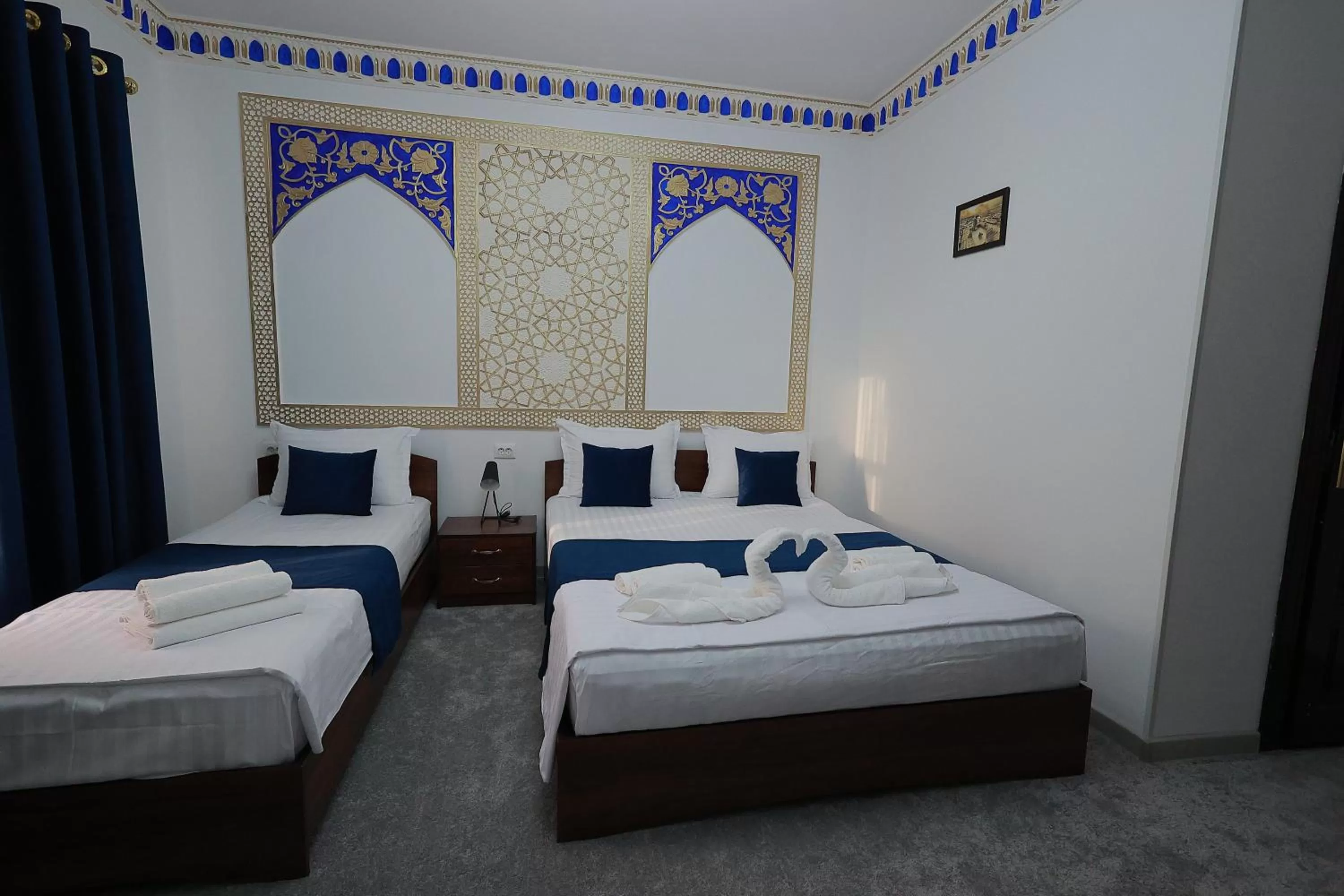 towels, Bed in Jahangir Boutique Bukhara