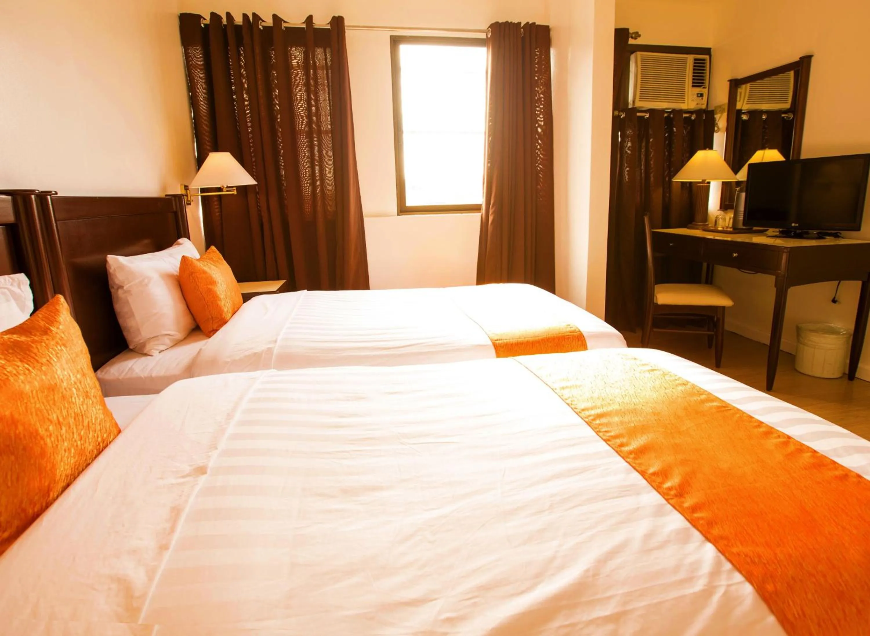 Bed in Harbor Town Hotel