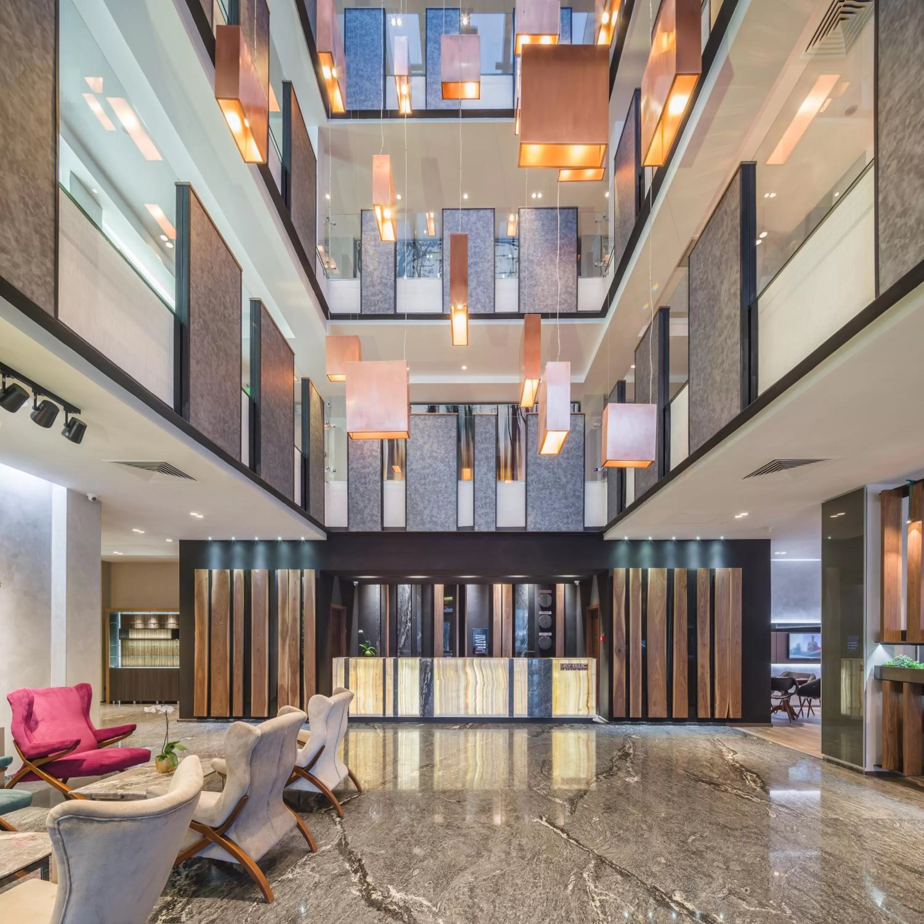 Communal lounge/ TV room in Sky Blue Hotel & Spa