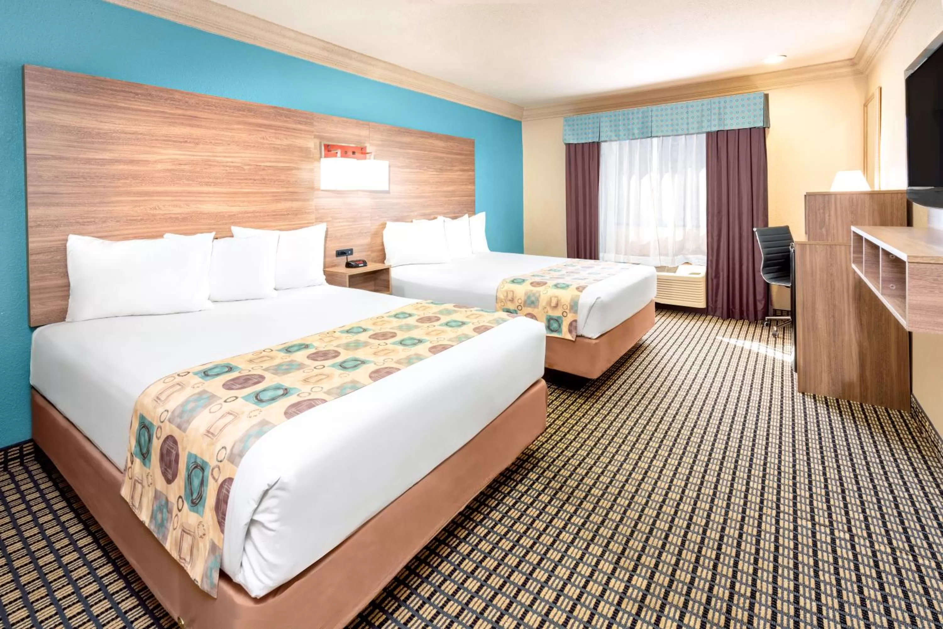 Photo of the whole room, Bed in Ramada by Wyndham Houston Intercontinental Airport South