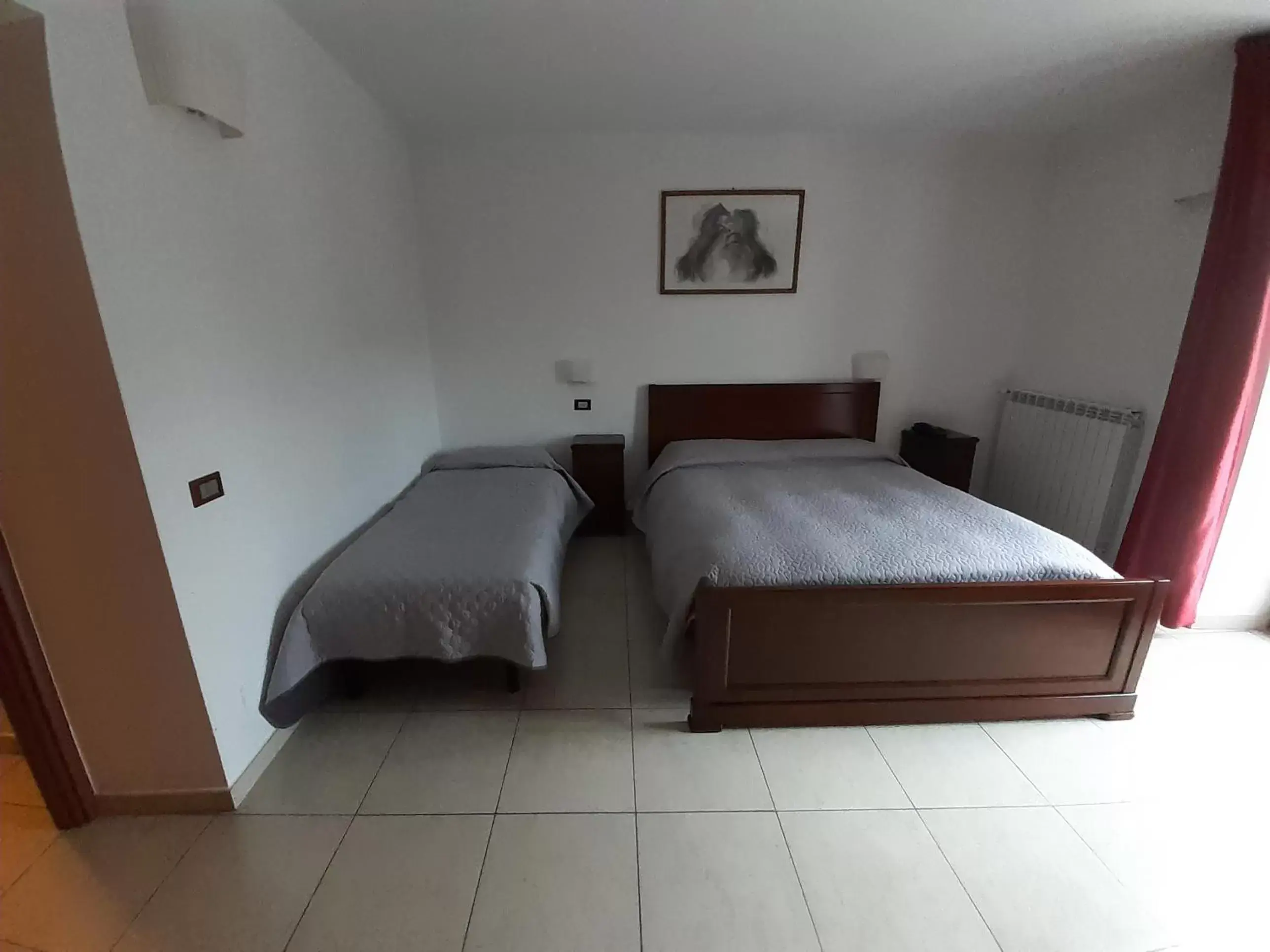 Quadruple Room in La Corte di Bacco Hotel & Ristorante Quadruple Room in La Corte di Bacco Hotel & Ristorante