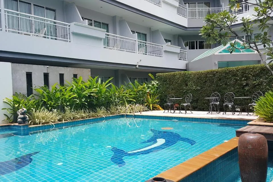 Swimming pool in Baan Suksiri Hotel