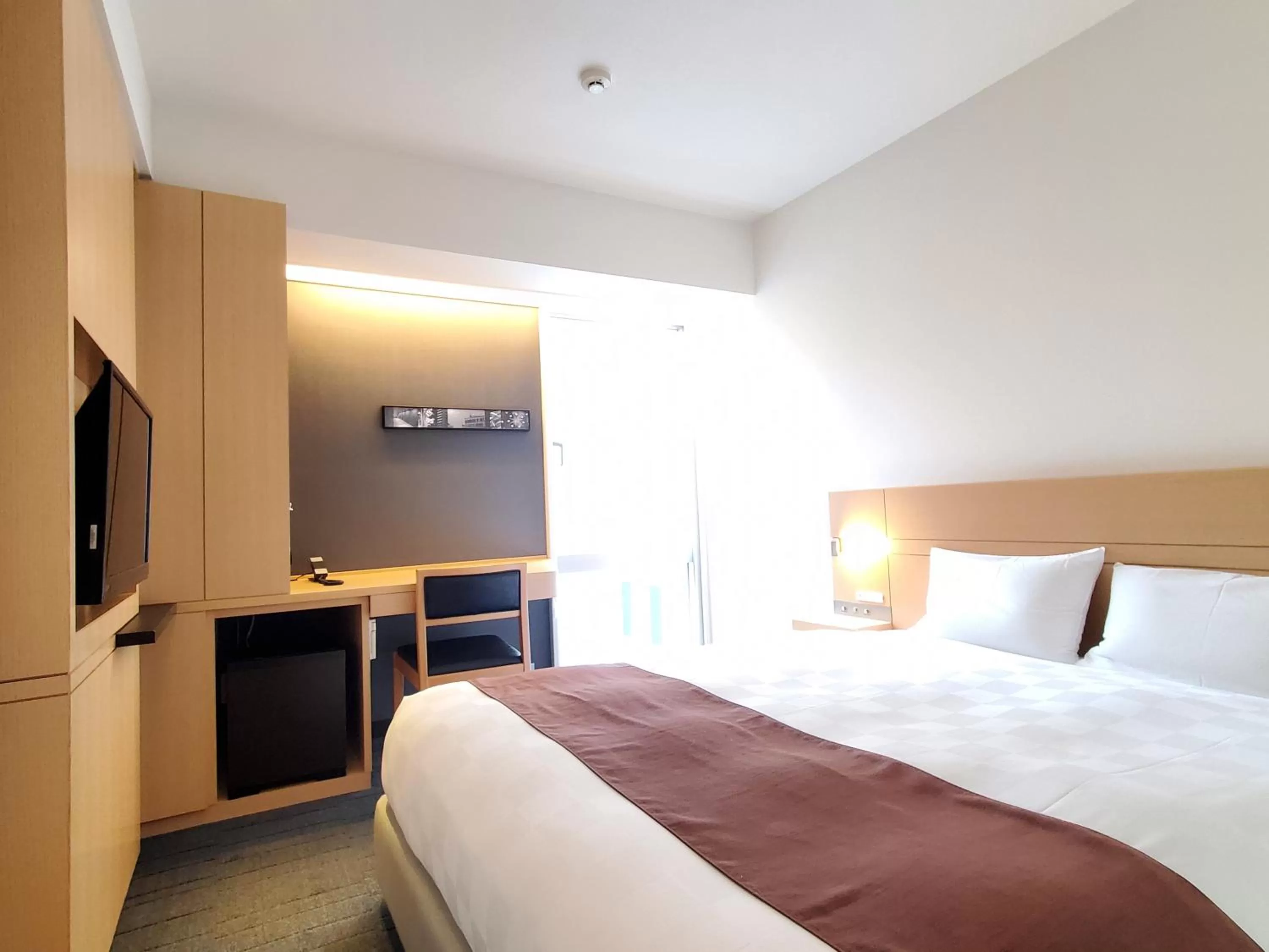 Bed in Hakata Tokyu REI Hotel