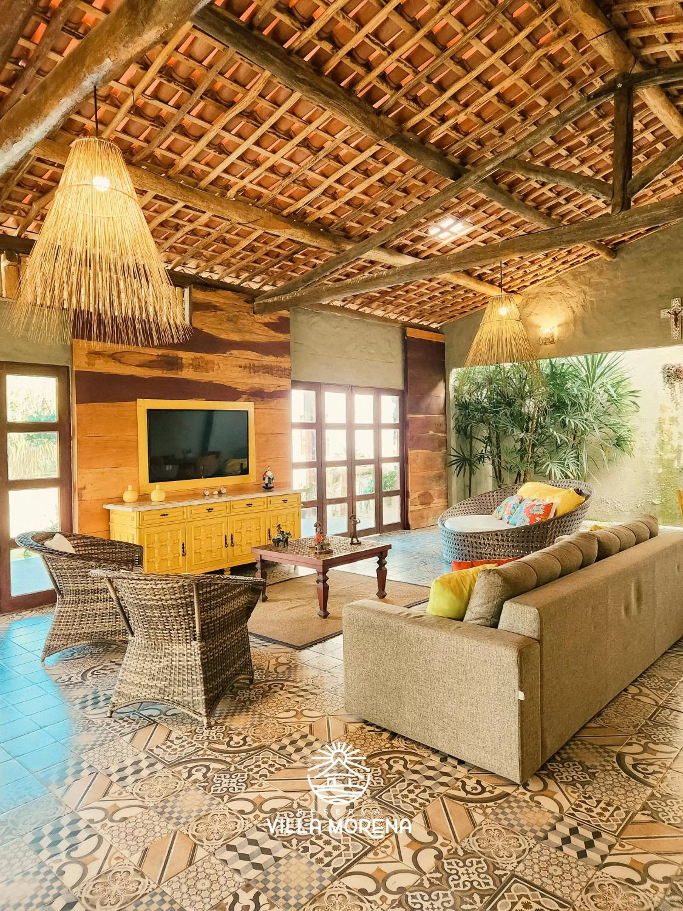 Communal lounge/ TV room in Pousada Villa Morena