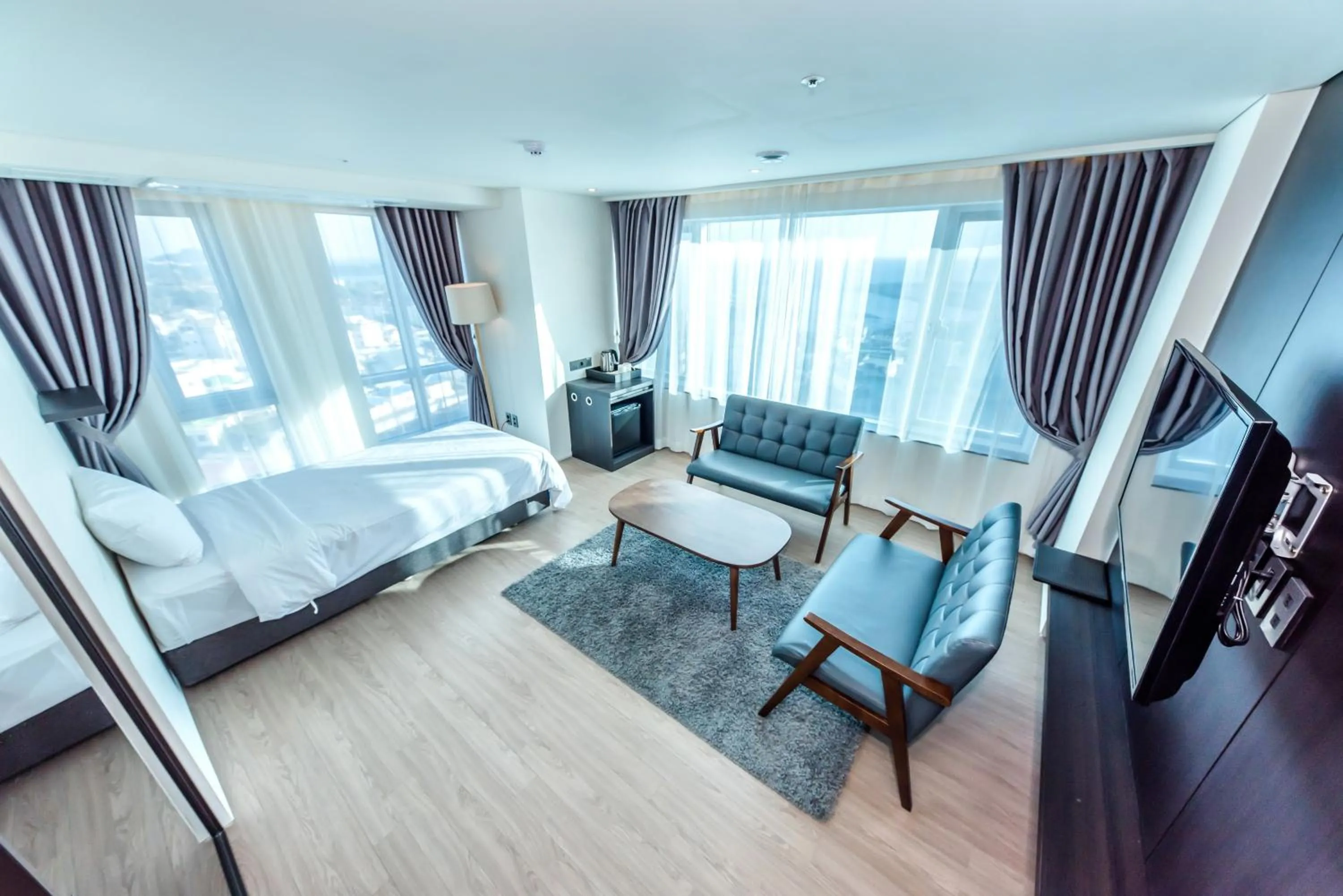 Living room, Bed in The First70 Hotel