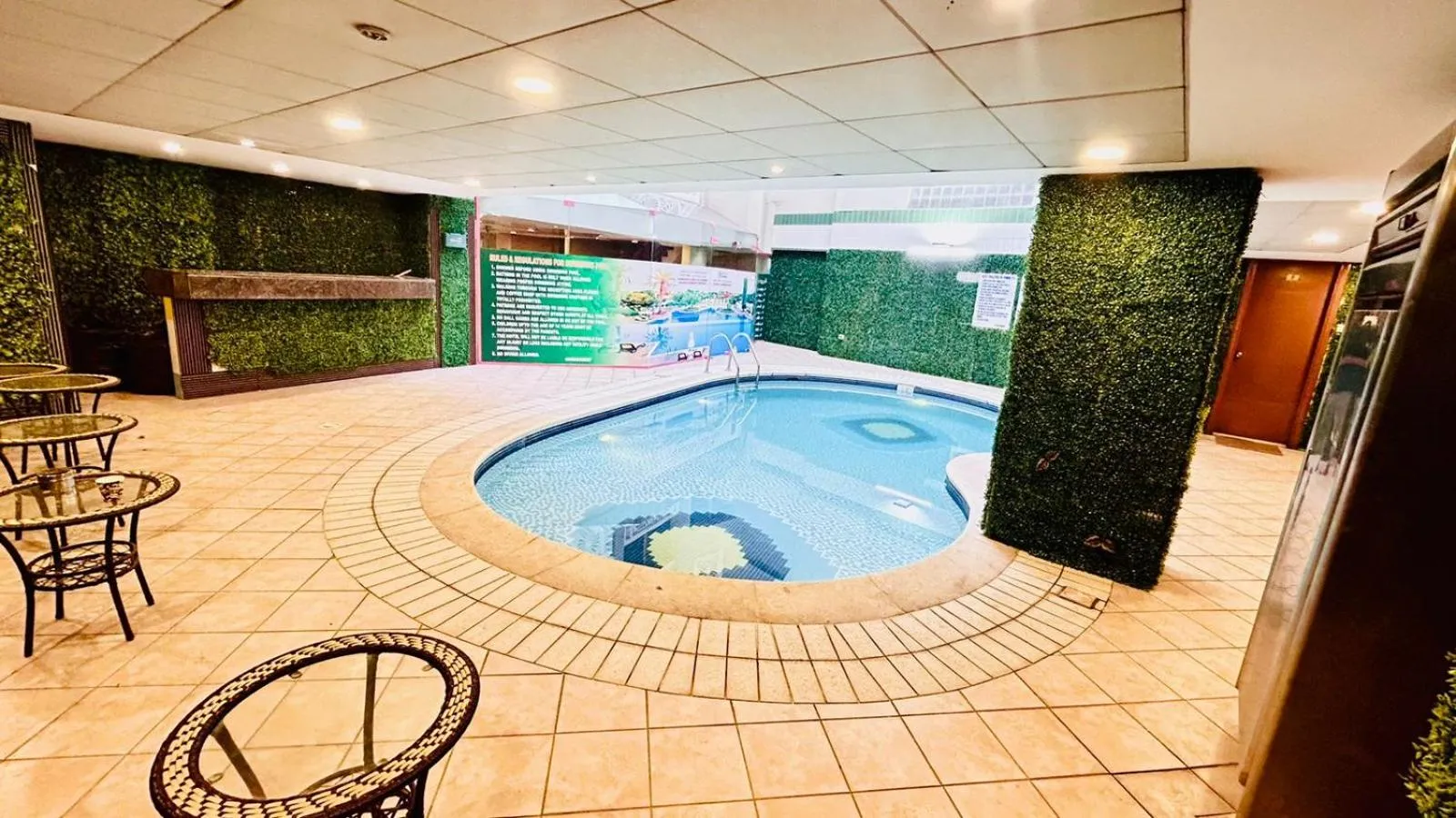 Swimming pool in Queens Hotel Next Sabkha Bus Station