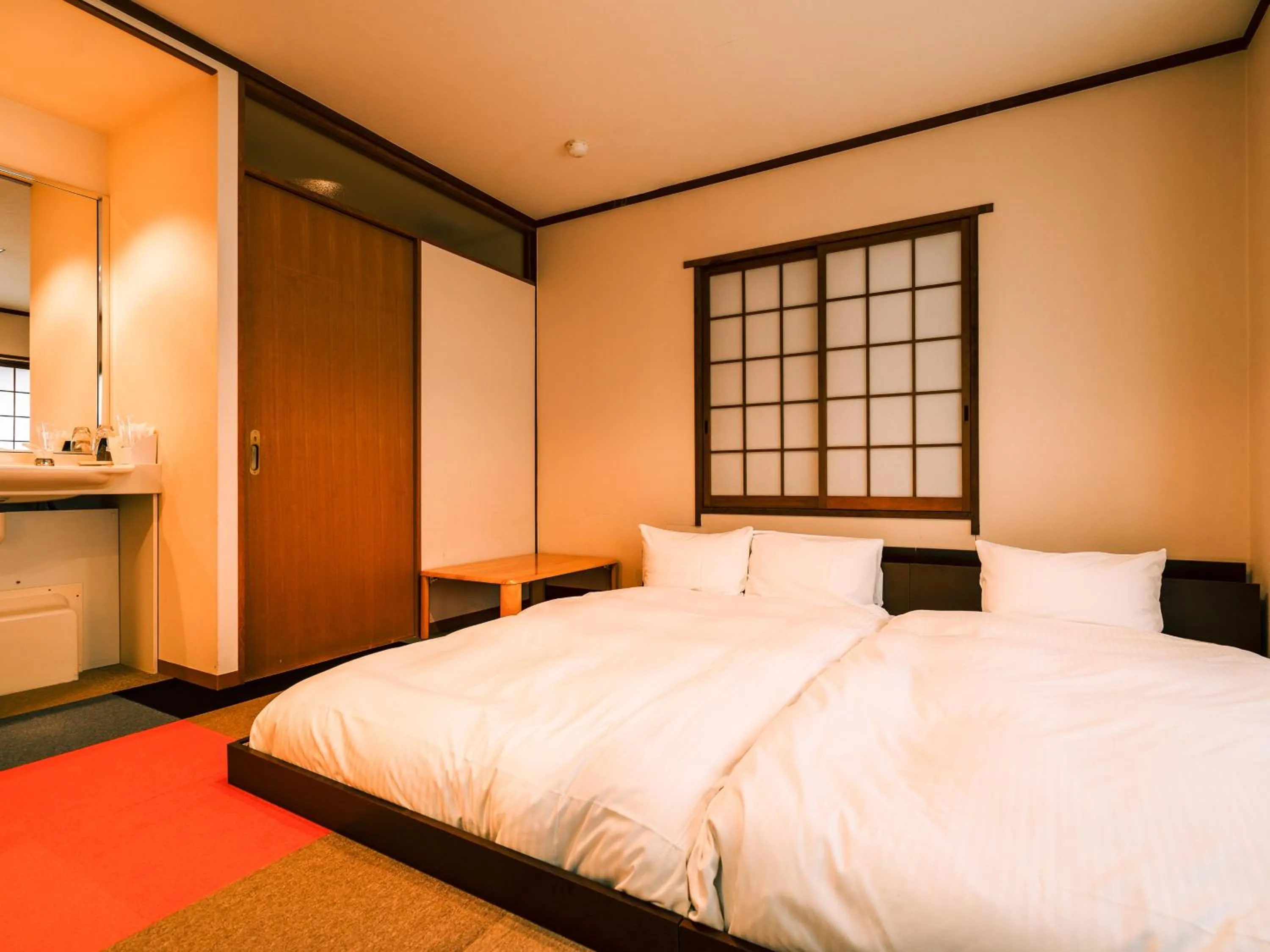 Photo of the whole room, Bed in Hotel AreaOne Takamatsu
