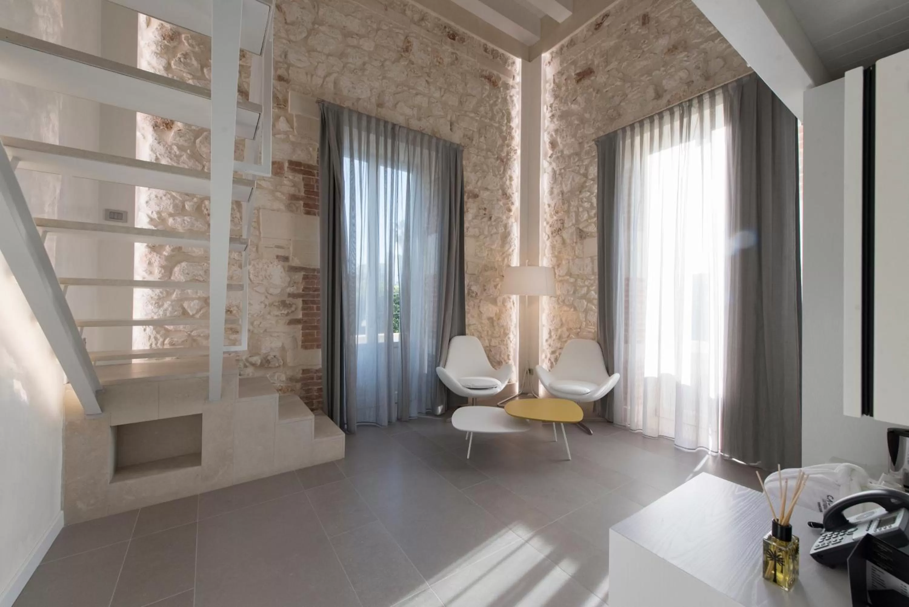 Bed in Caportigia Boutique Hotel