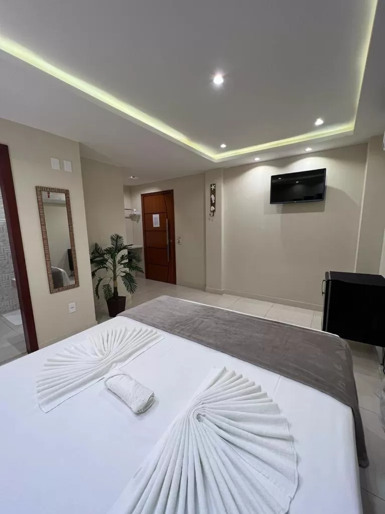 Bed in Pousada Arraial Tropical