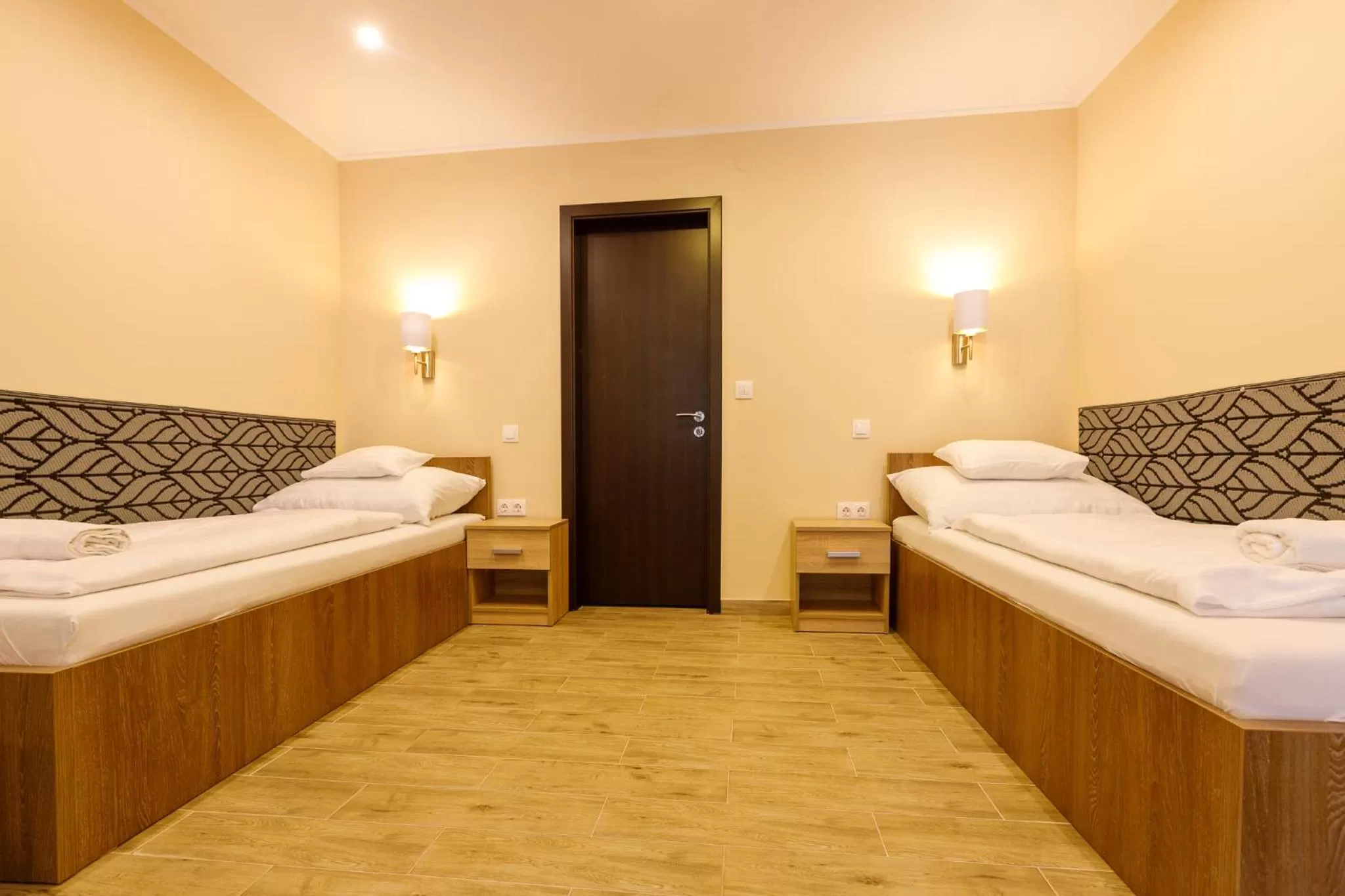 Bed in Central Panzió Gyula