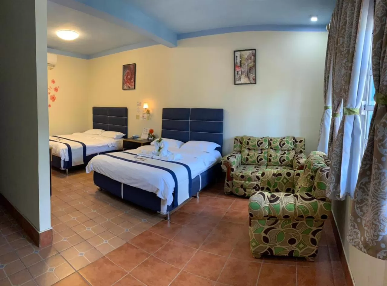 Bed in Sunshine View Hotel and Restaurant