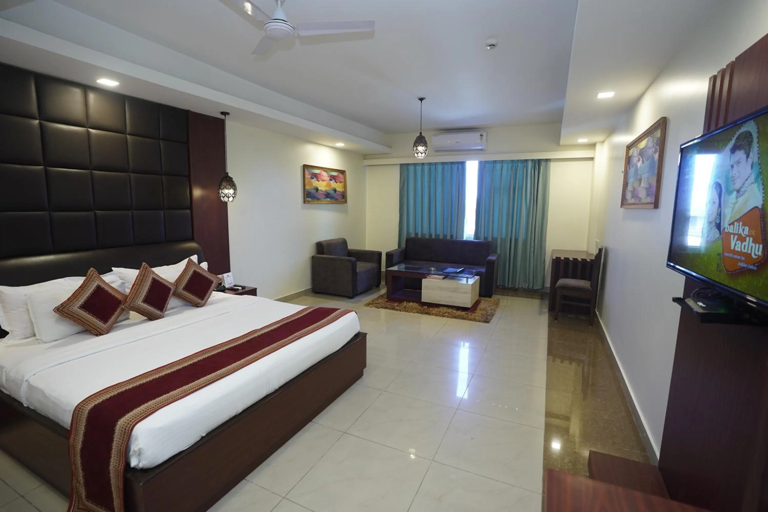 Photo of the whole room, Bed in HOTEL AVN GRAND