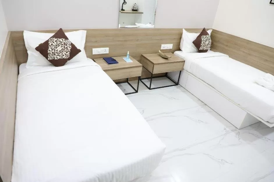 Bed in SwanSuites Gachibowli