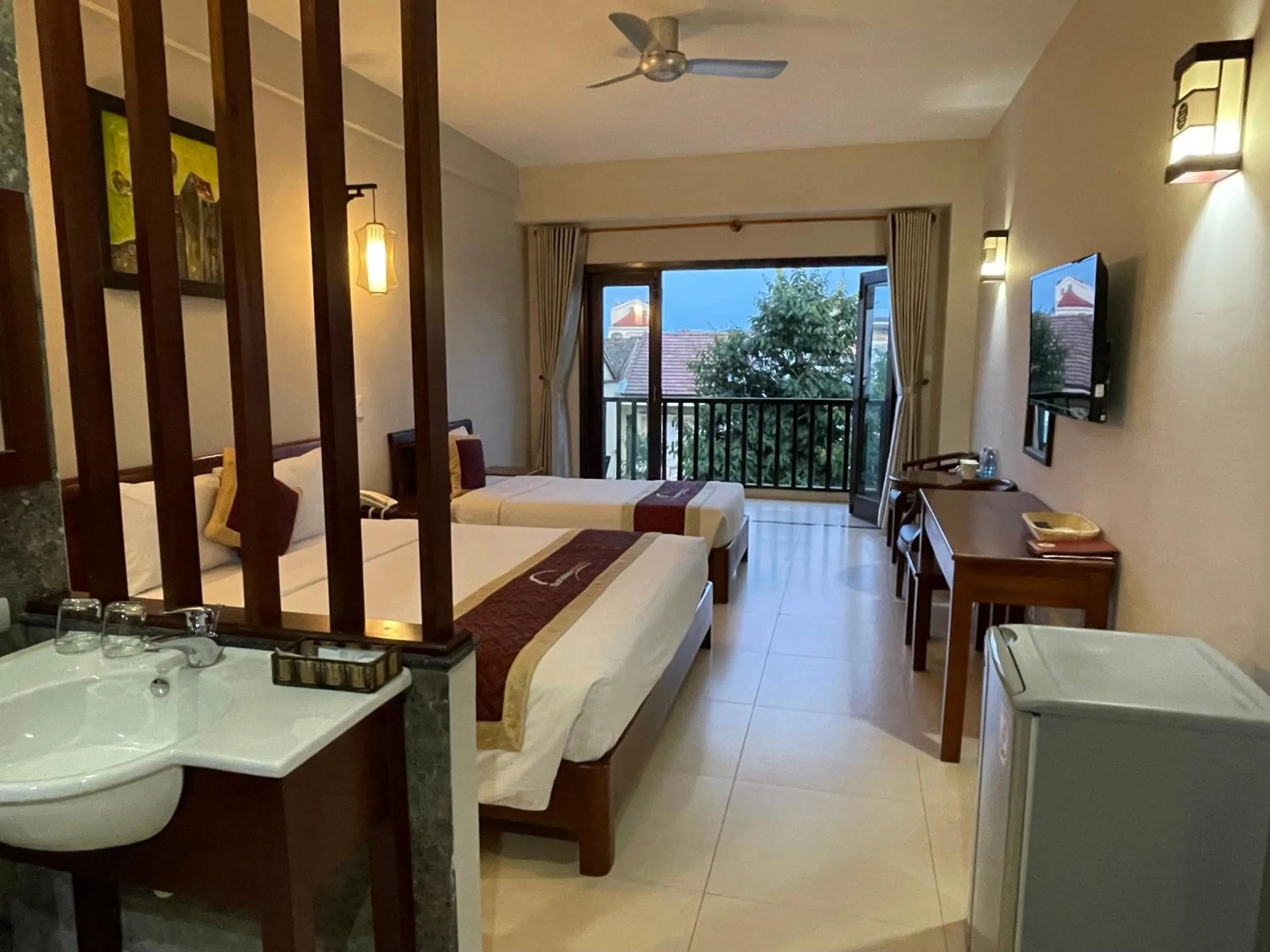 Bed in Sunshine Hoian Hotel