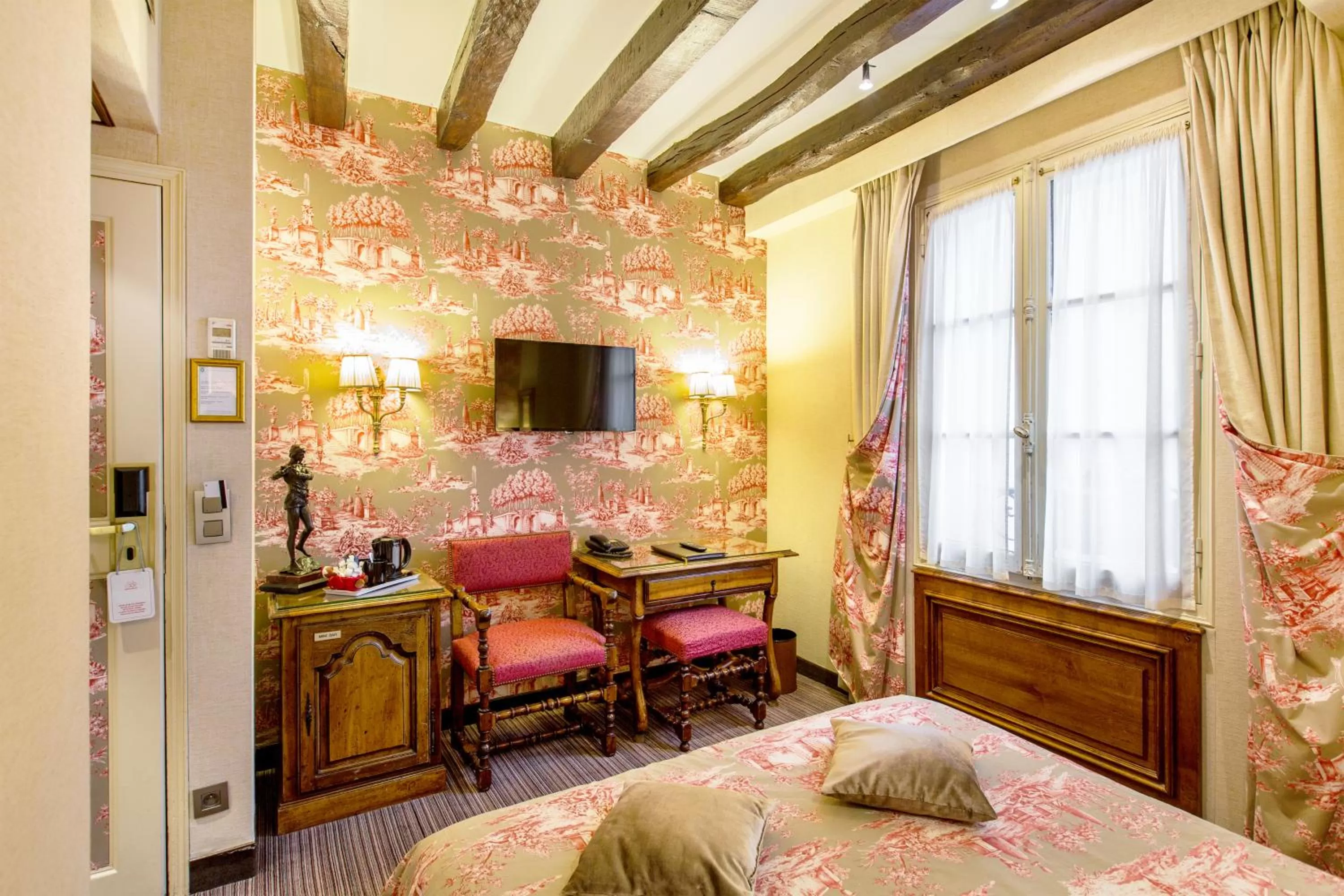 Decorative detail, Bed in Hotel Left Bank Saint Germain